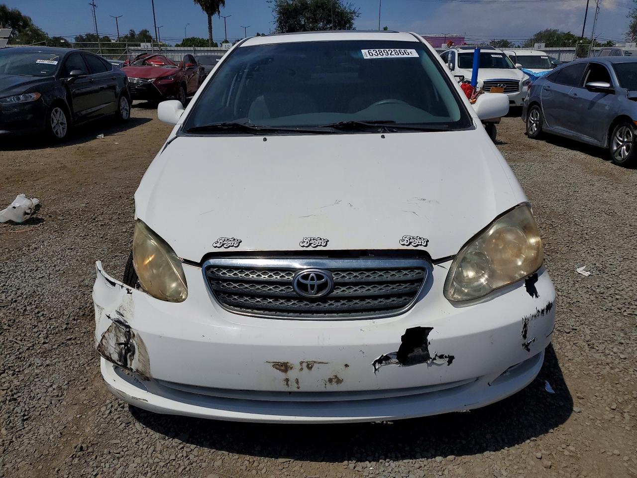 2003 Toyota Corolla Le White vin: JTDBR32E030021282