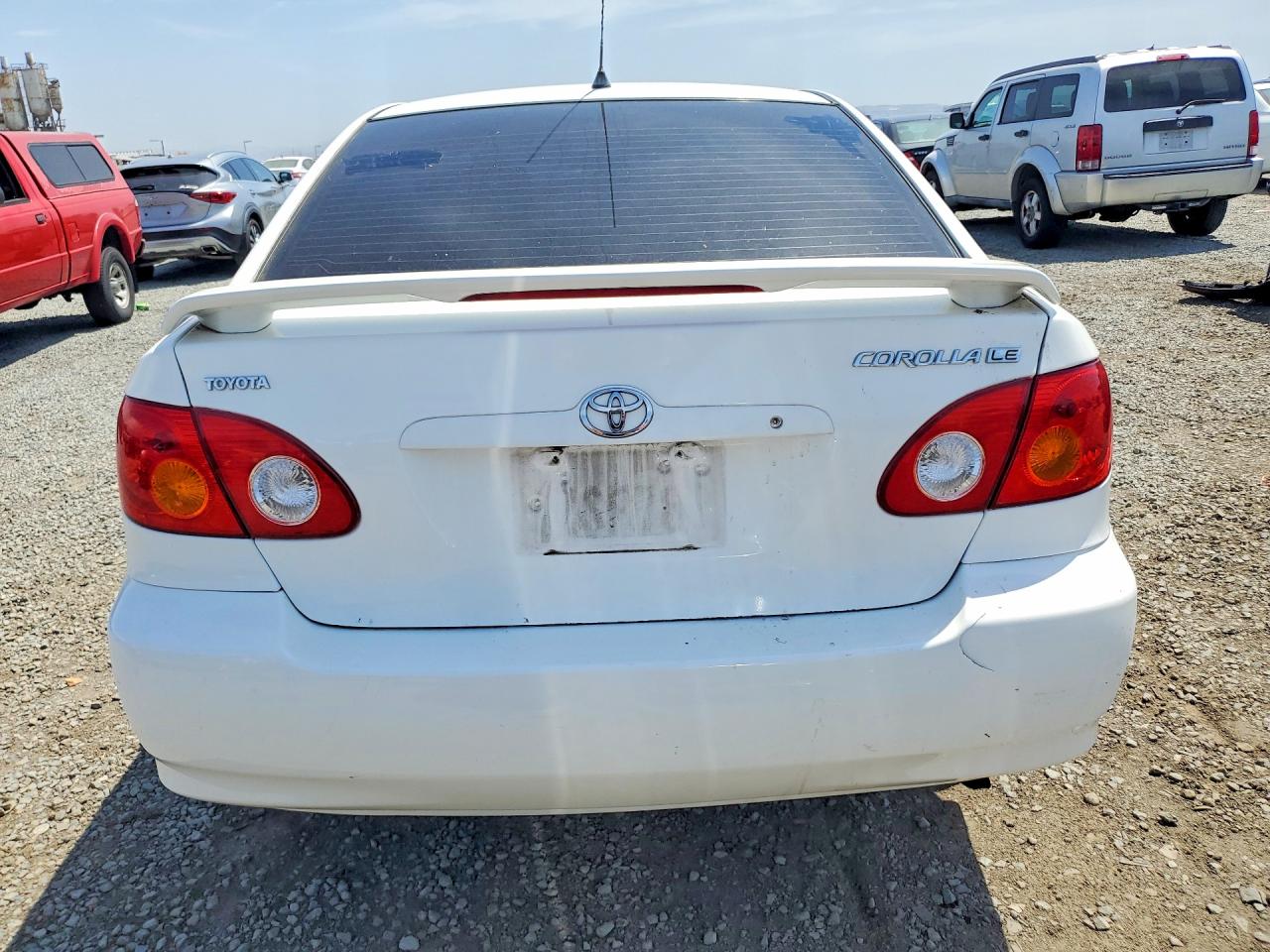 2003 Toyota Corolla Le White vin: JTDBR32E030021282