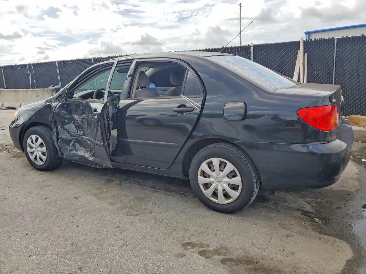 2003 Toyota Corolla Le Black vin: JTDBR32E032011484