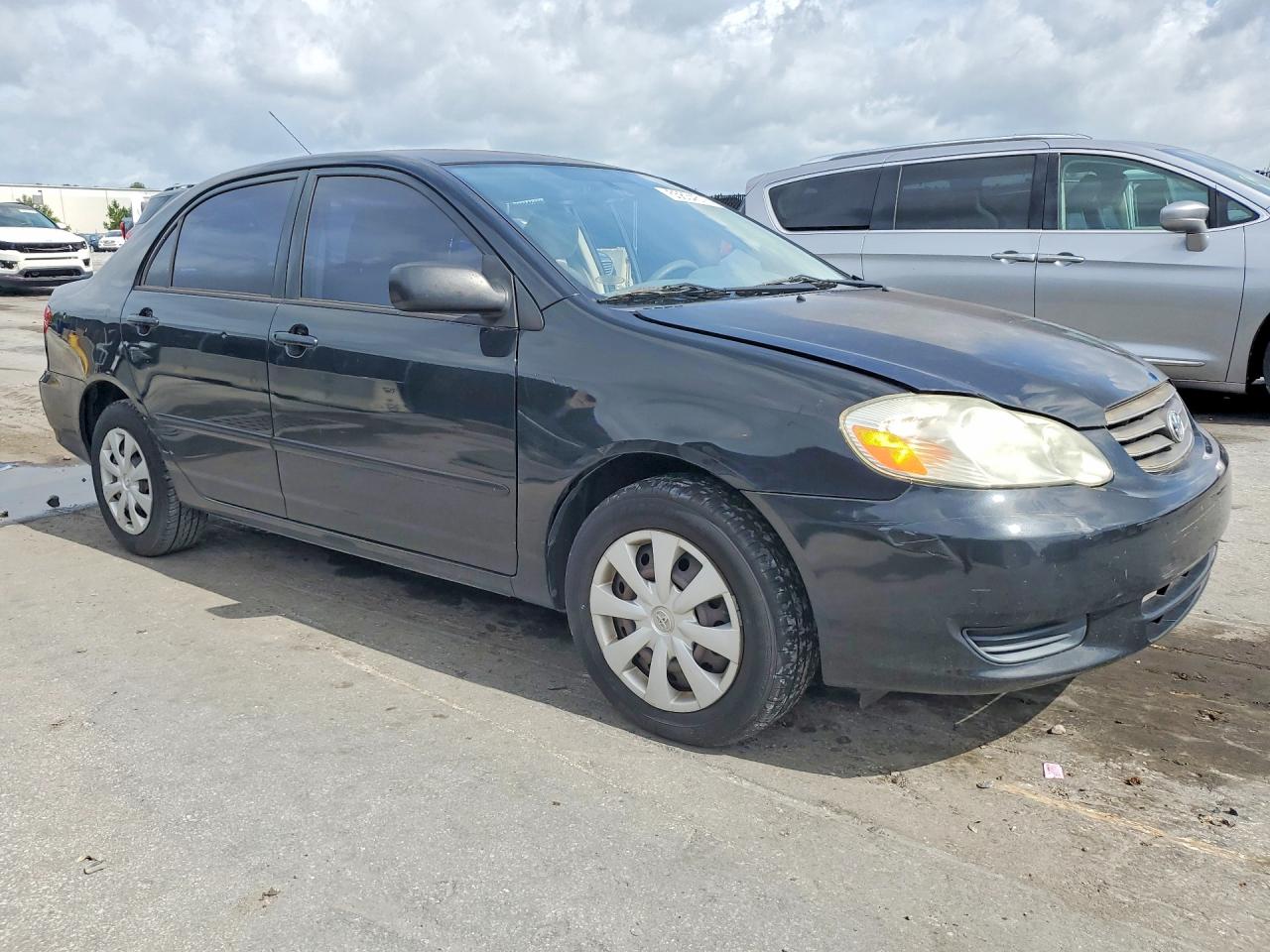 2003 Toyota Corolla Le Black vin: JTDBR32E032011484
