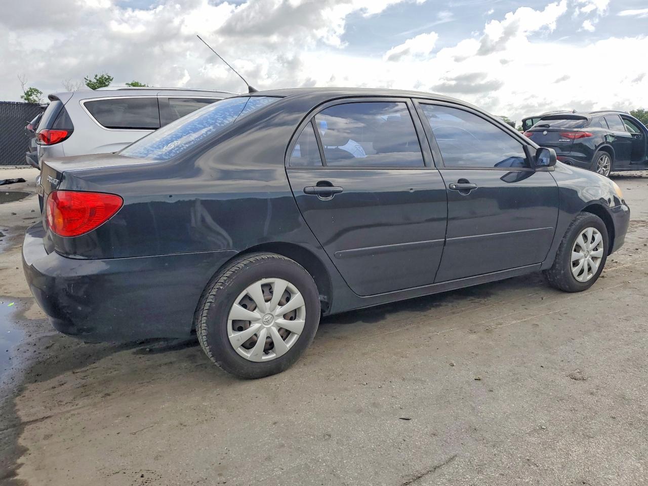 2003 Toyota Corolla Le Black vin: JTDBR32E032011484