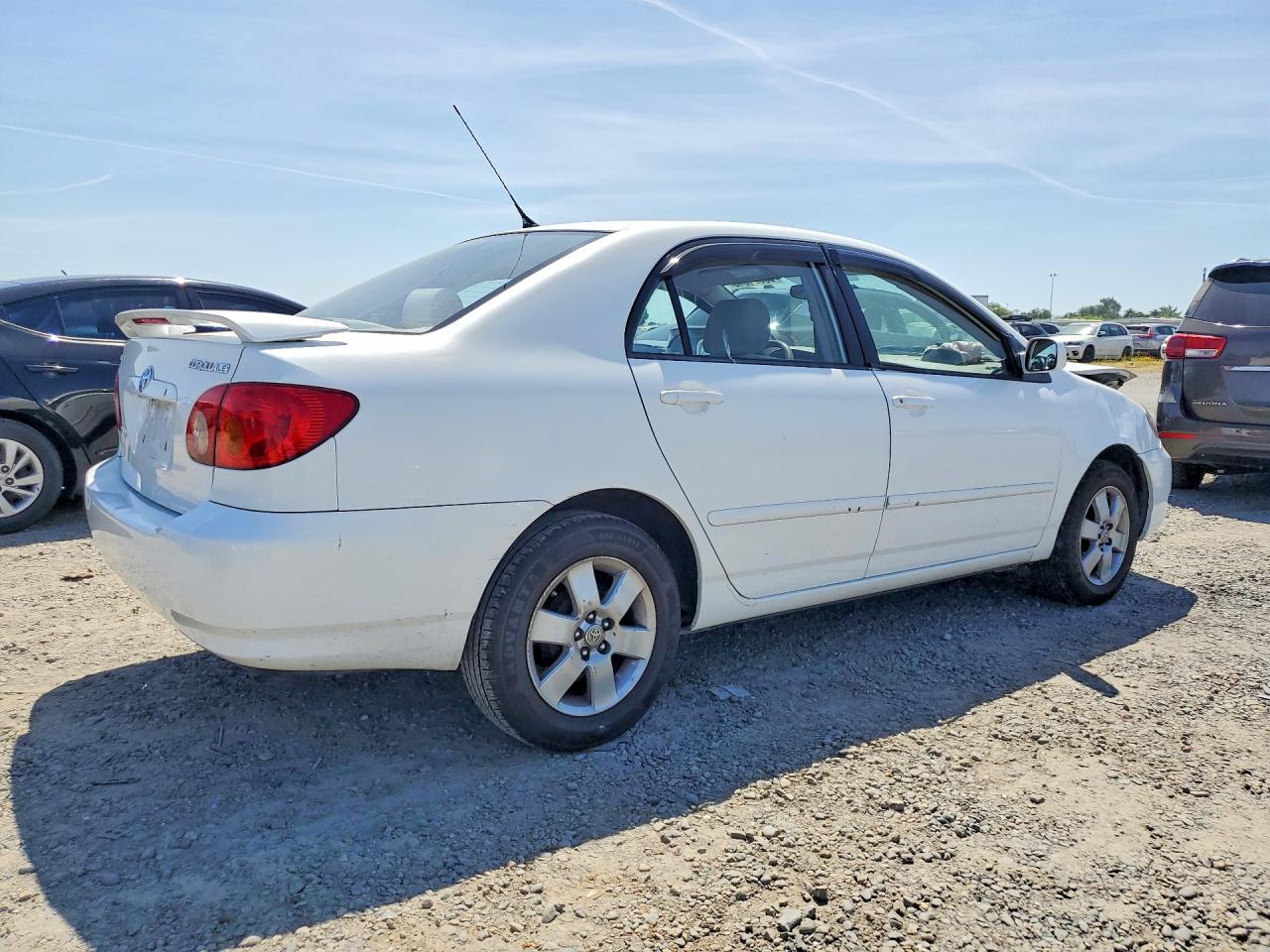 2004 Toyota Corolla Le White vin: JTDBR32E042024933