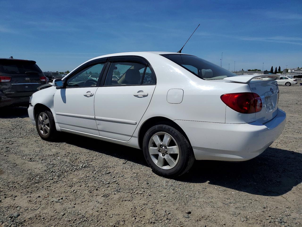 2004 Toyota Corolla Le White vin: JTDBR32E042024933