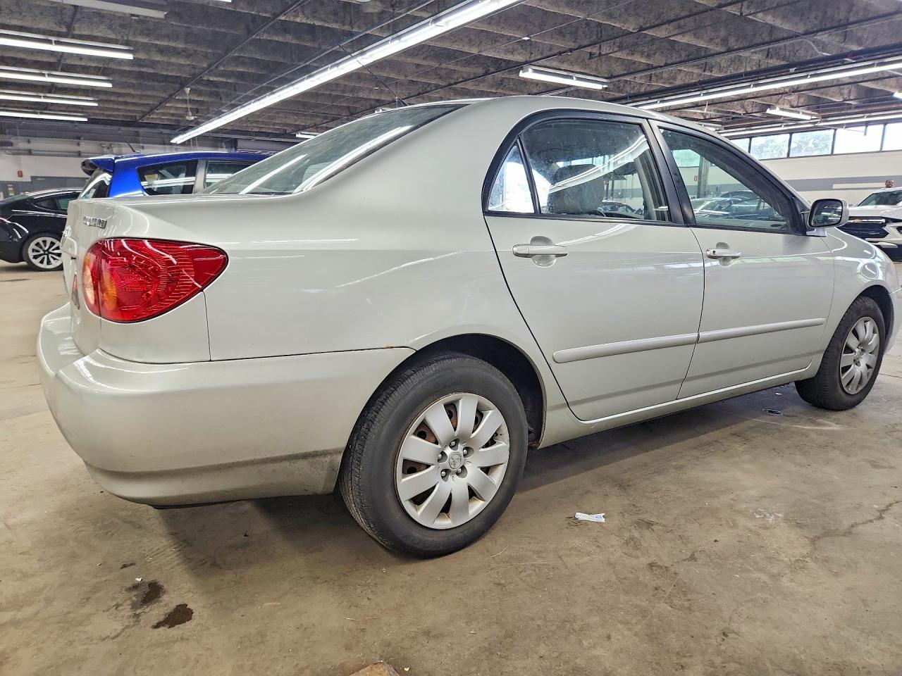 2004 Toyota Corolla Le Beige vin: JTDBR32E042031655
