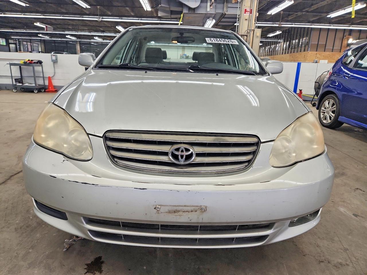 2004 Toyota Corolla Le Beige vin: JTDBR32E042031655
