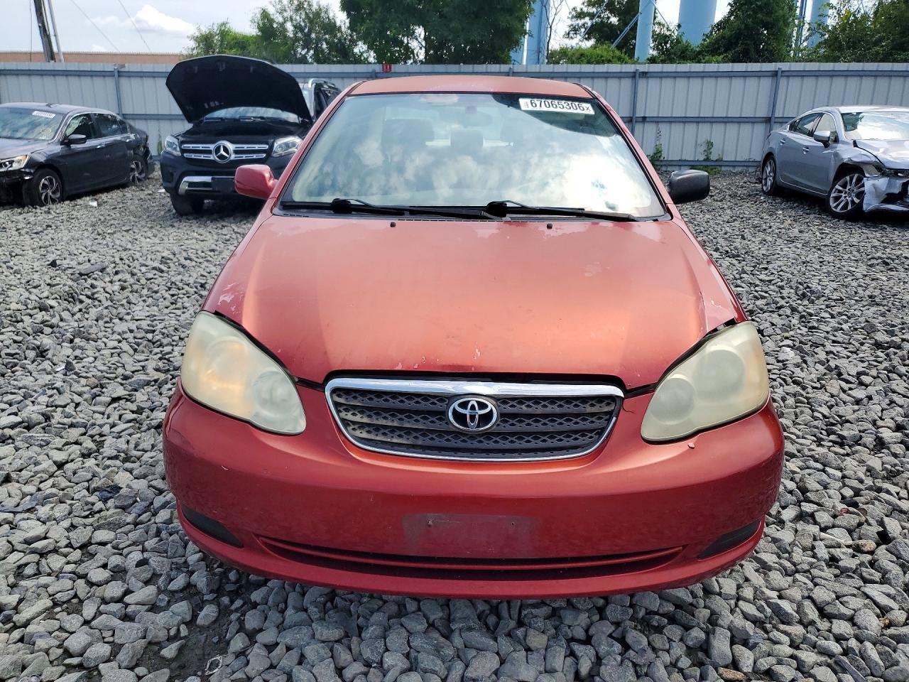 2006 Toyota Corolla Le Red vin: JTDBR32E060060829