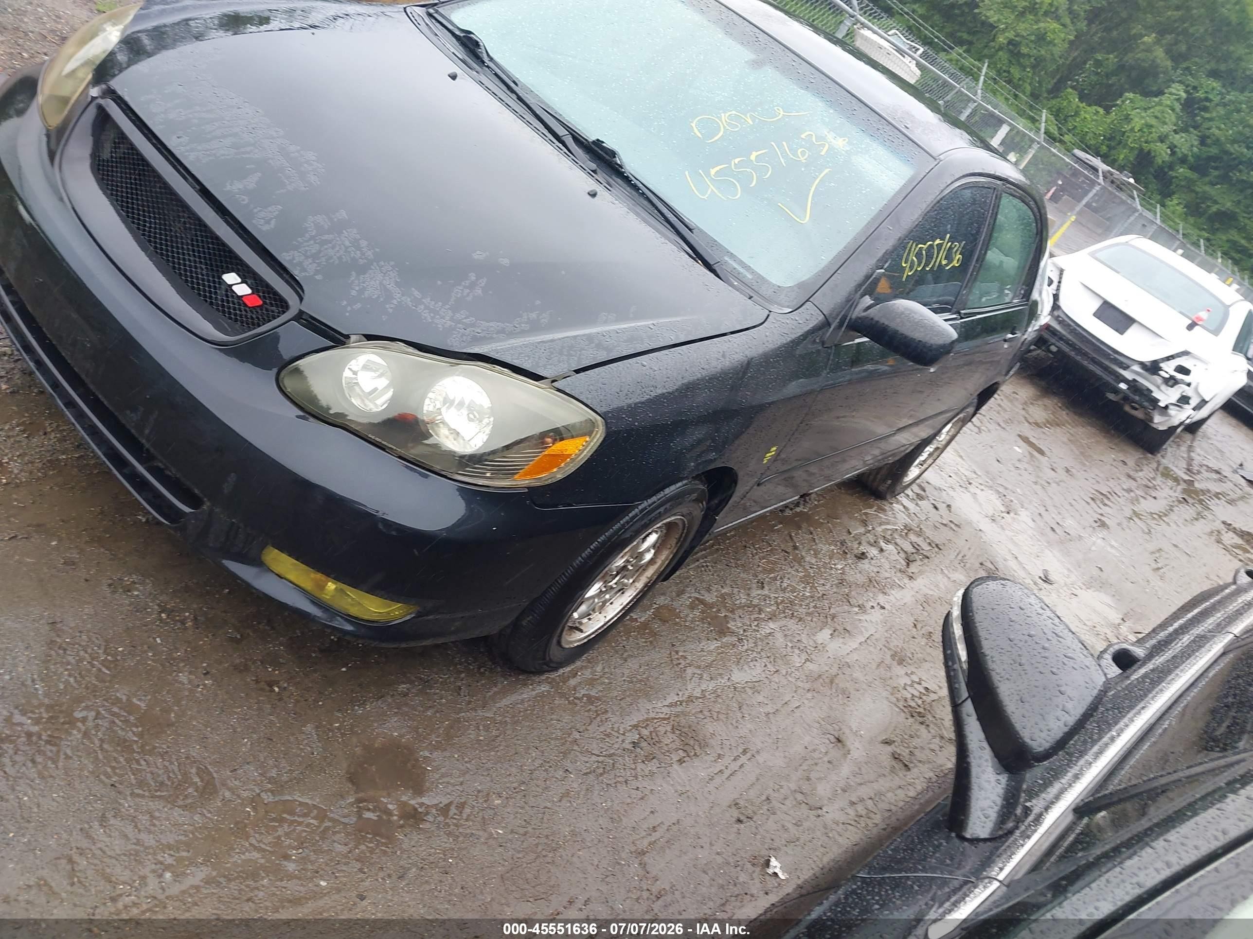 2004 Toyota Corolla Le Black vin: JTDBR32E142043409