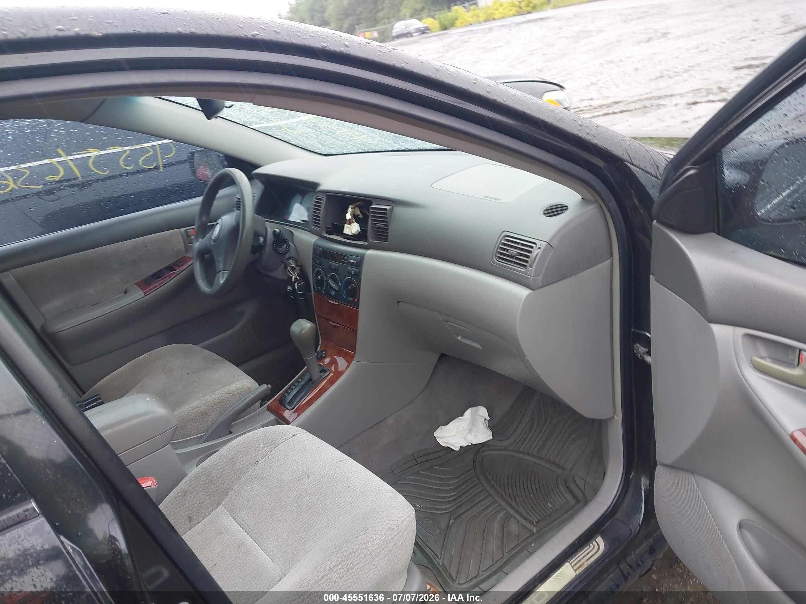 2004 Toyota Corolla Le Black vin: JTDBR32E142043409