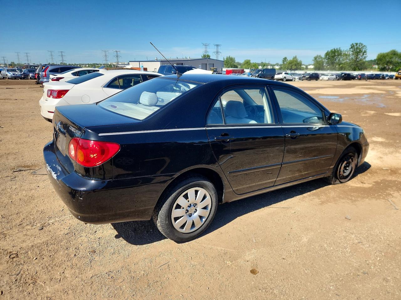 2003 Toyota Corolla Le Черный vin: JTDBR32E230040562