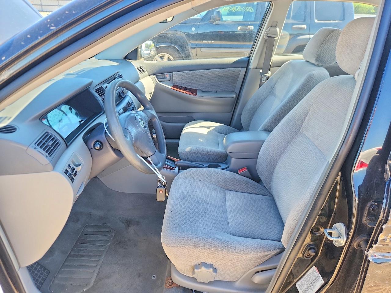 2003 Toyota Corolla Le Черный vin: JTDBR32E230040562