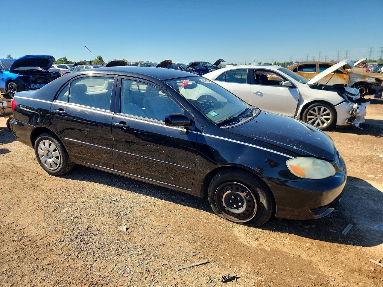 2003 Toyota Corolla Le Черный vin: JTDBR32E230040562
