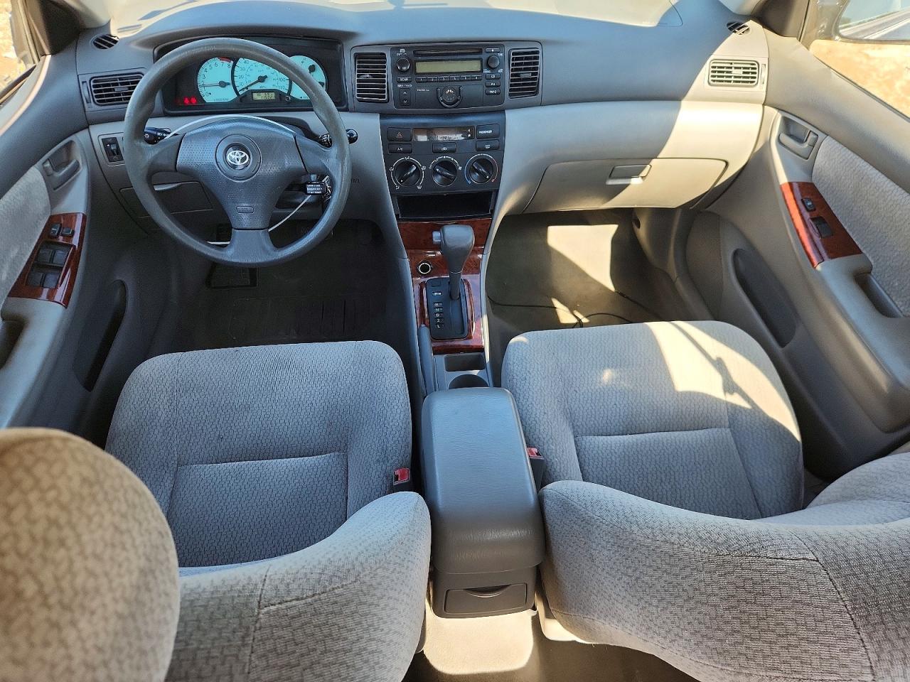 2003 Toyota Corolla Le Черный vin: JTDBR32E230040562