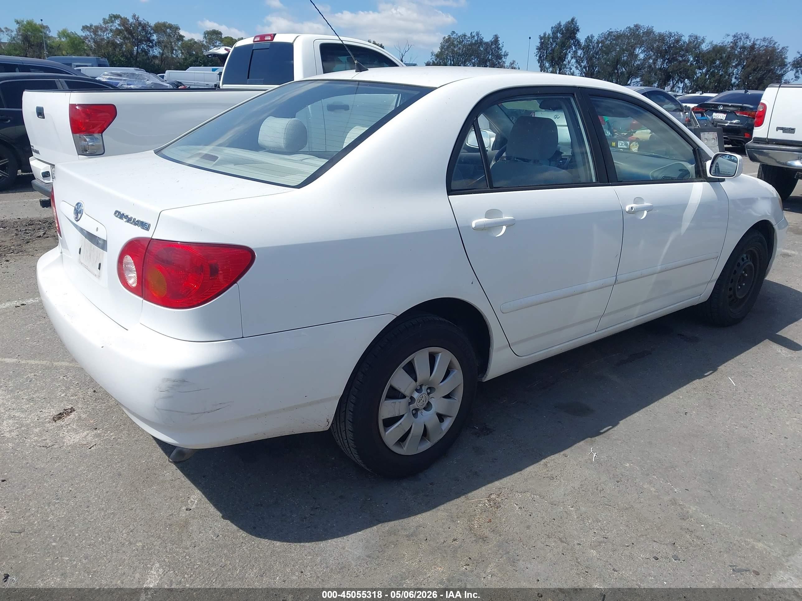 2003 Toyota Corolla Le White vin: JTDBR32E330014035