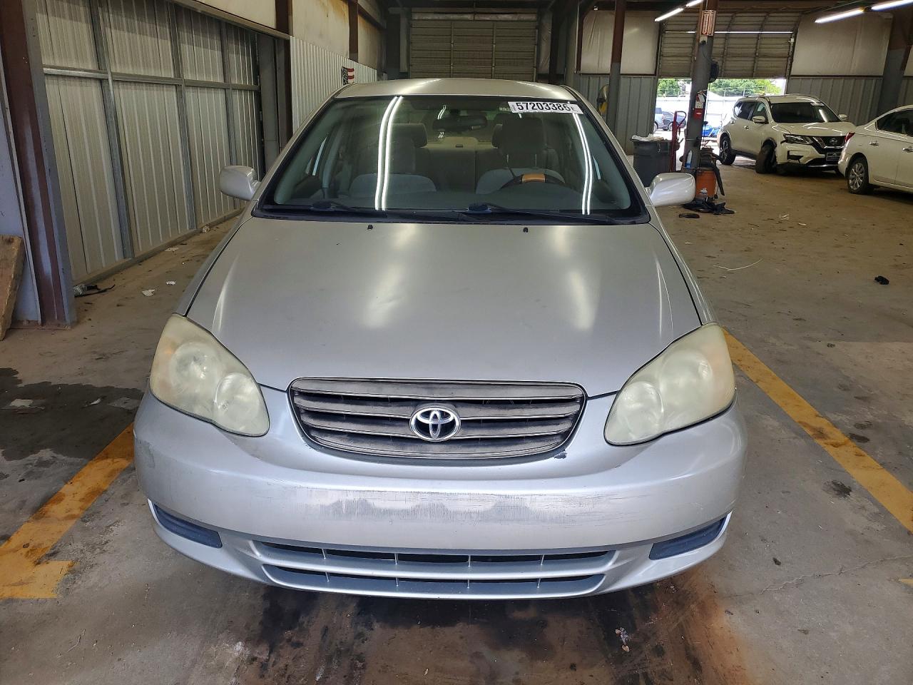 2003 Toyota Corolla Le Tan vin: JTDBR32E330039145