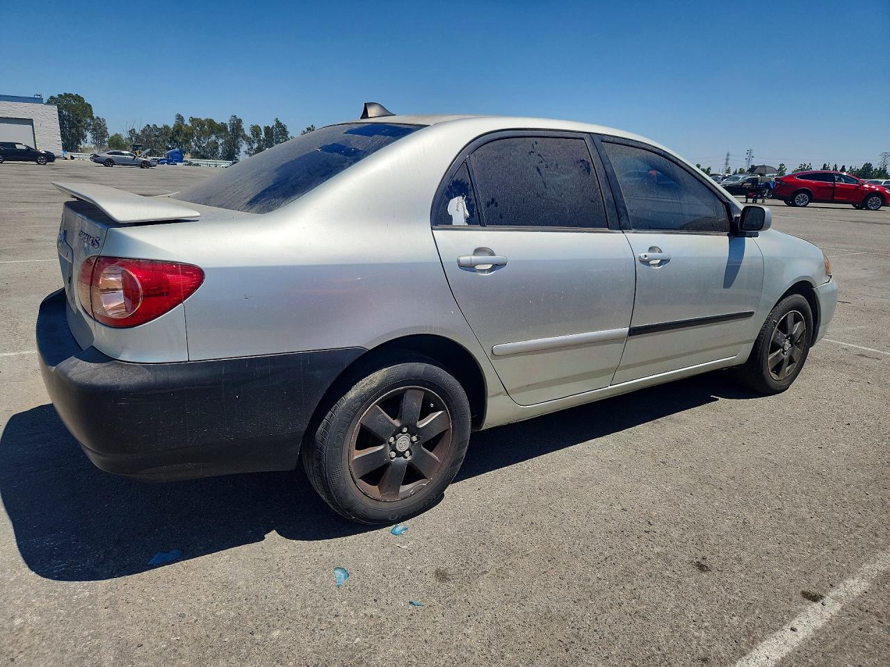 2003 Toyota Corolla Le Серебряный vin: JTDBR32E332009860