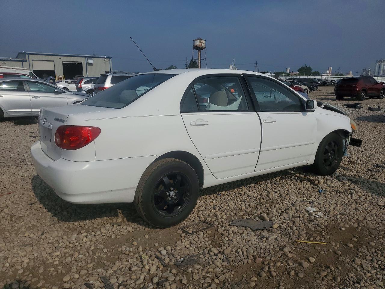 2003 Toyota Corolla Le White vin: JTDBR32E430024458