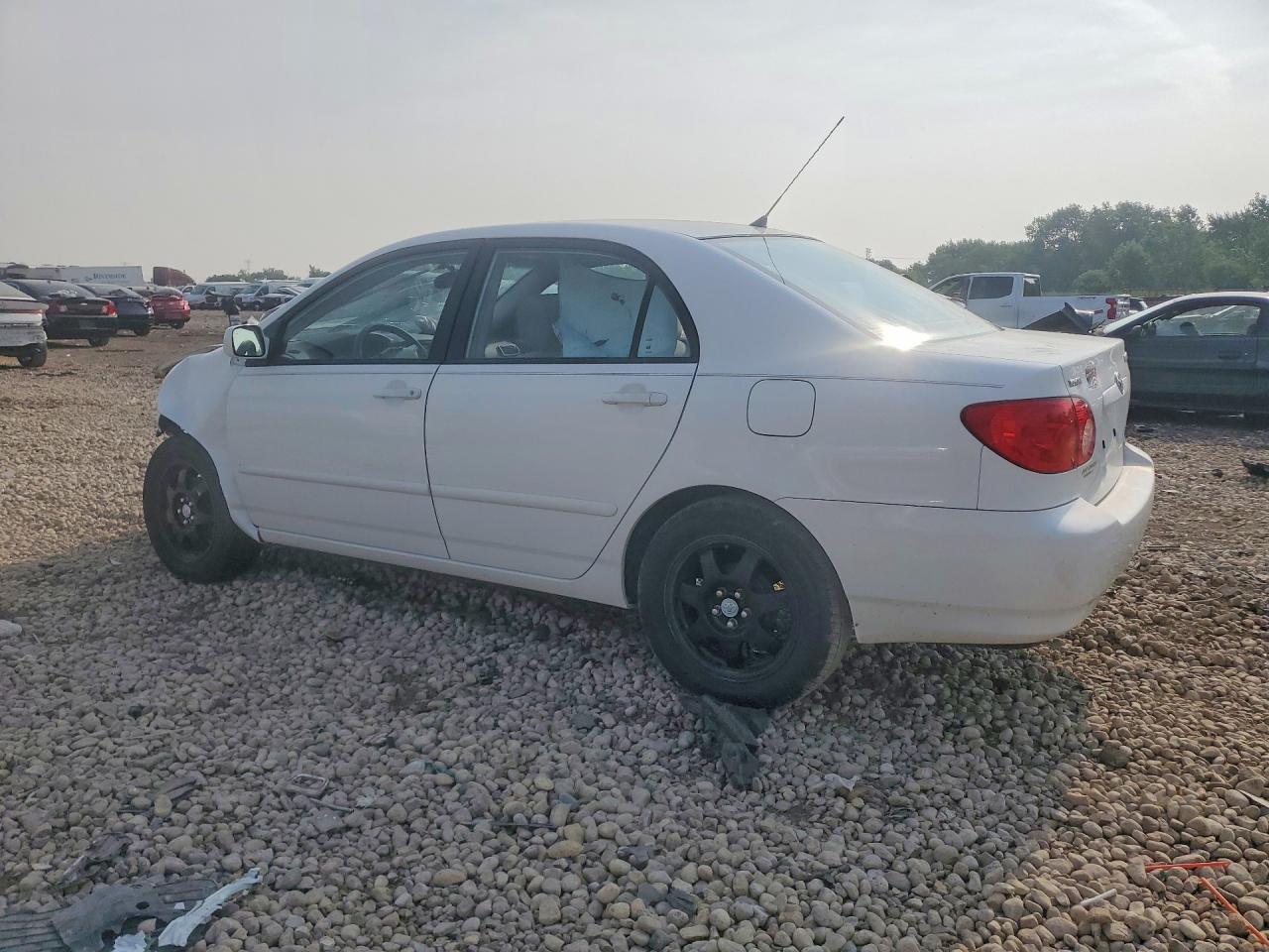 2003 Toyota Corolla Le White vin: JTDBR32E430024458