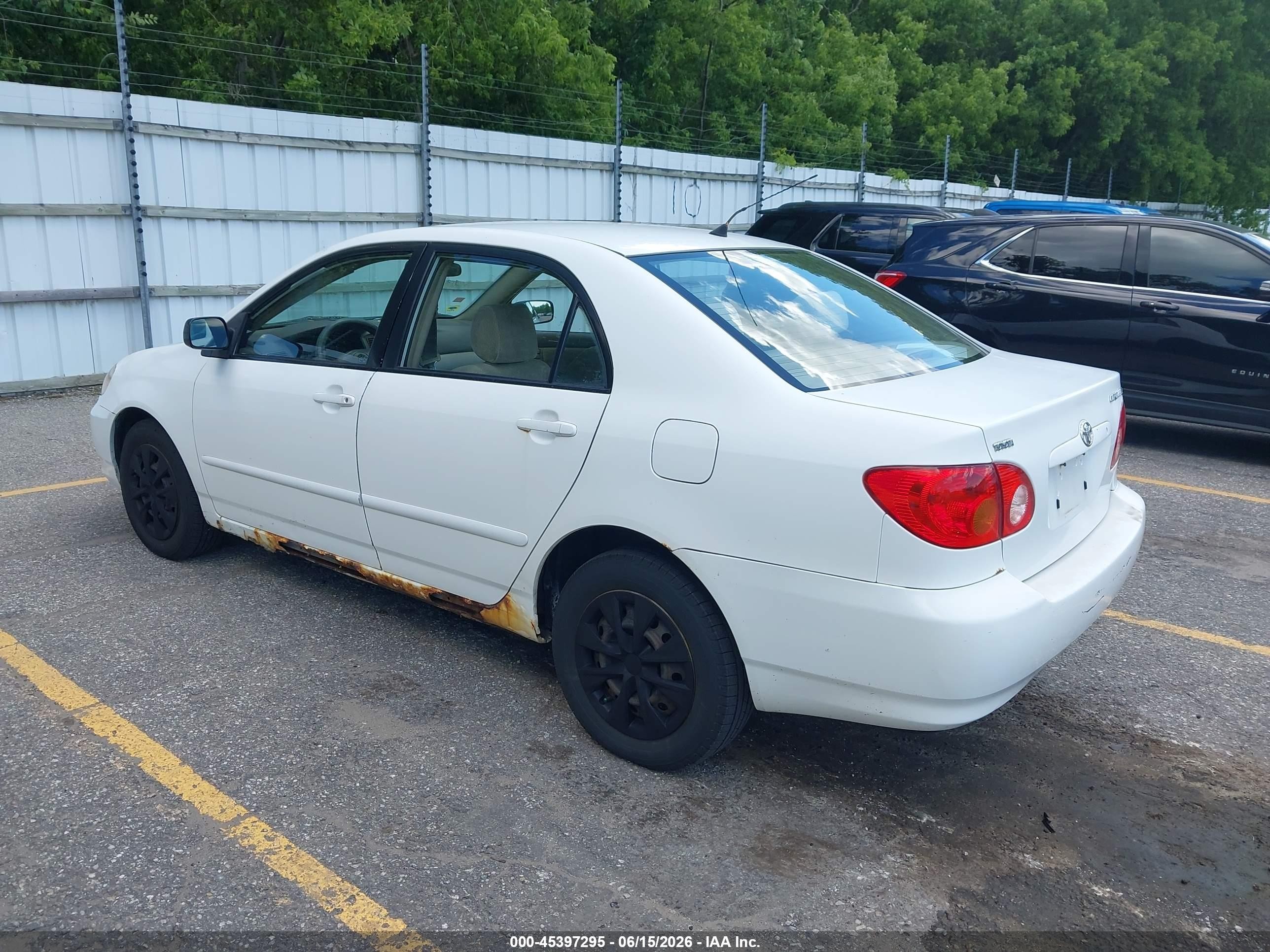 2003 Toyota Corolla Le White vin: JTDBR32E430038487