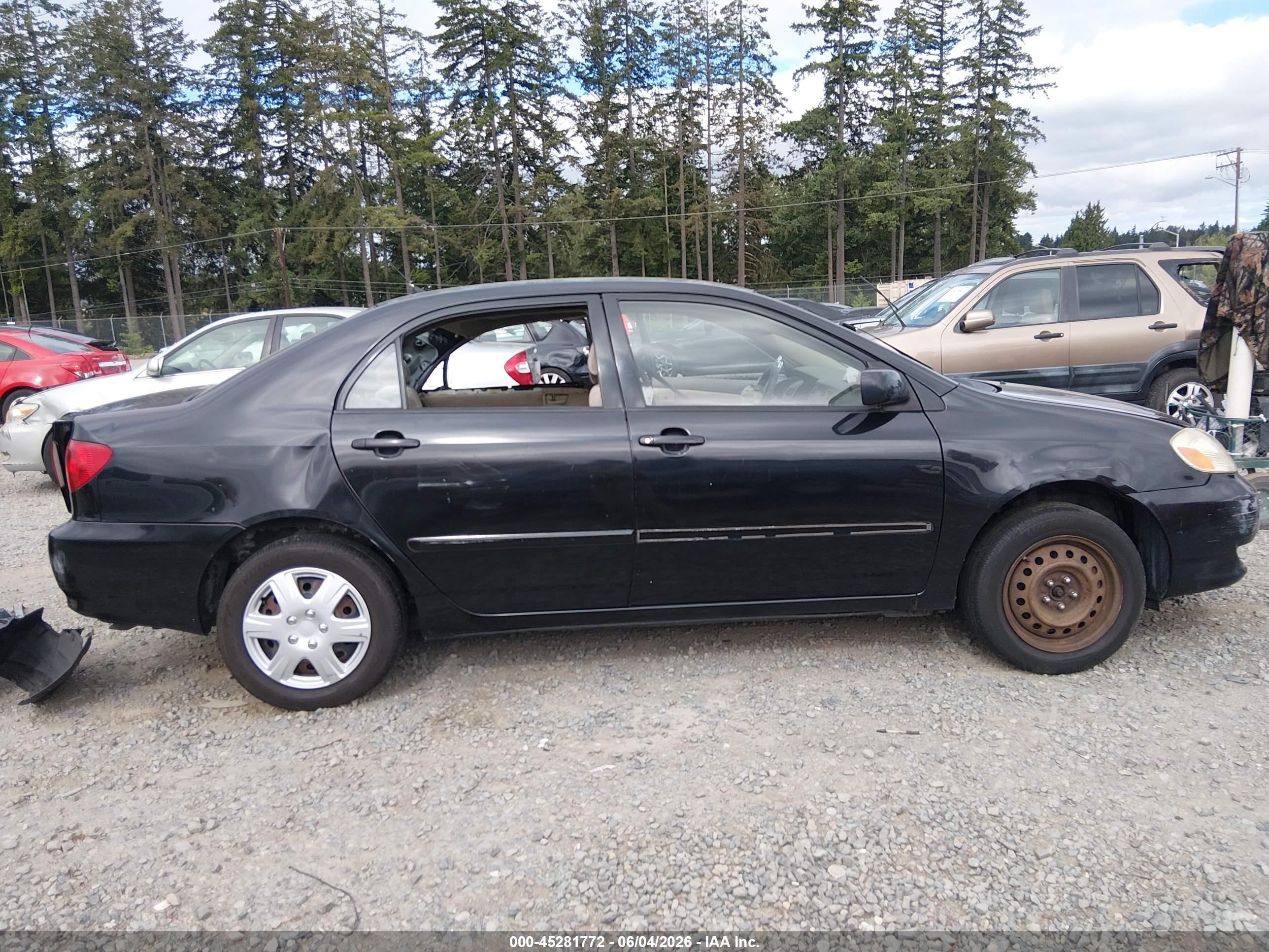 2003 Toyota Corolla Le Black vin: JTDBR32E430039042
