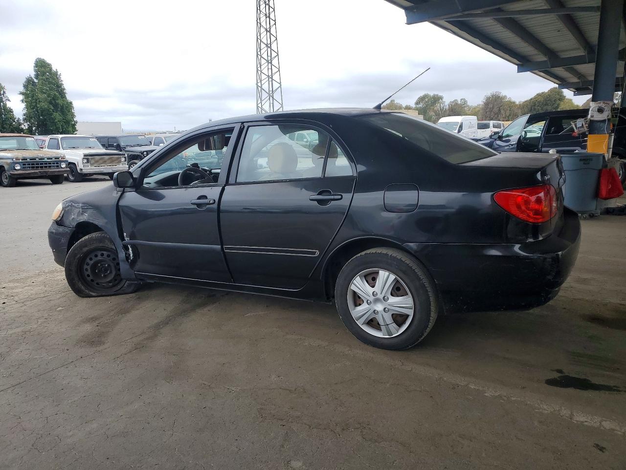 2003 Toyota Corolla Ce Black vin: JTDBR32E430049232