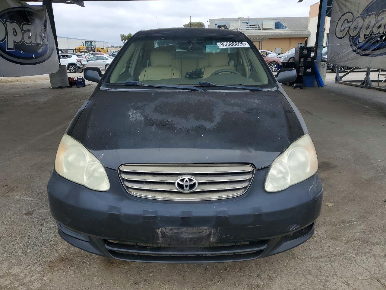 2003 Toyota Corolla Ce Black vin: JTDBR32E430049232