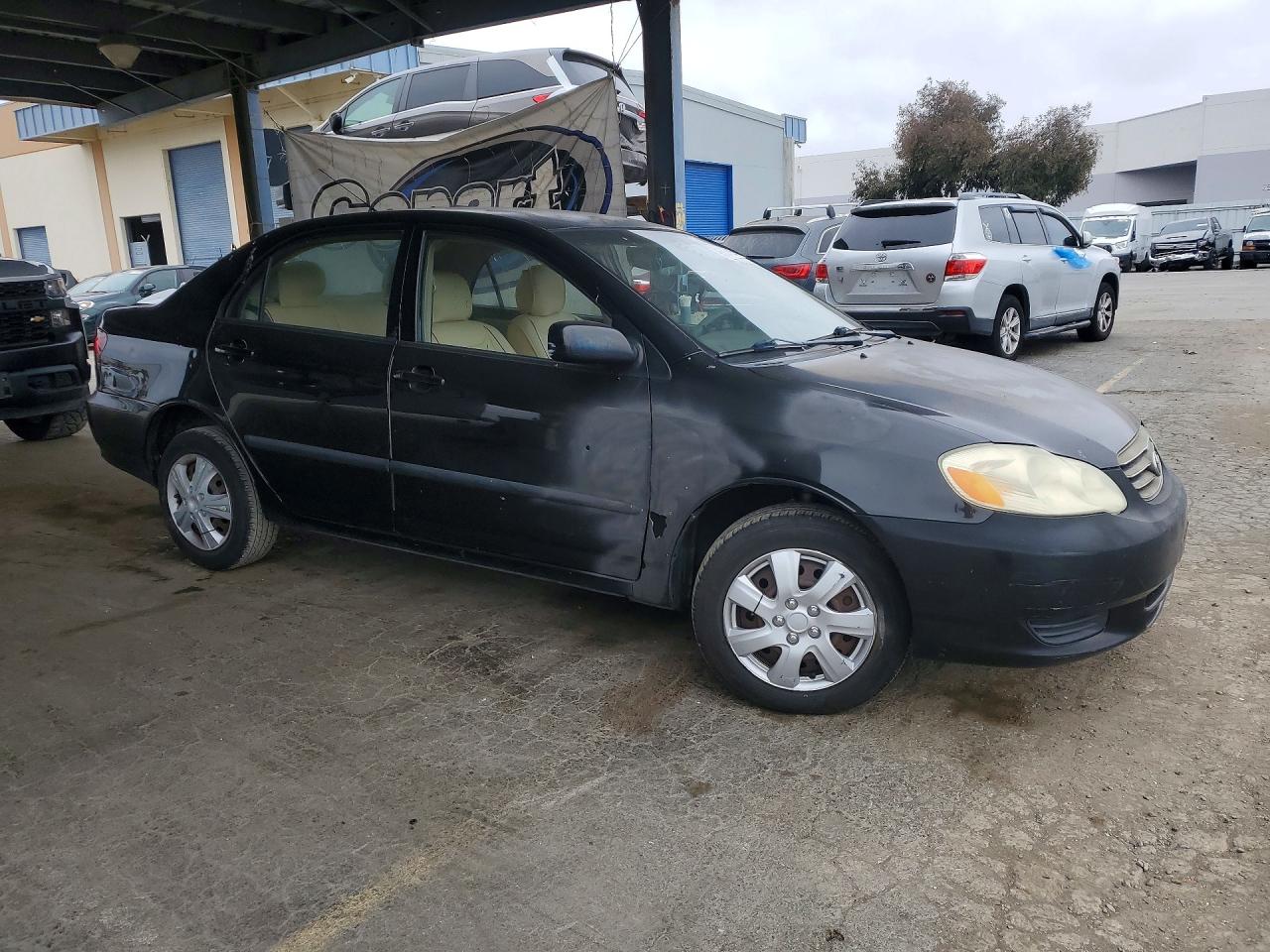 2003 Toyota Corolla Ce Black vin: JTDBR32E430049232