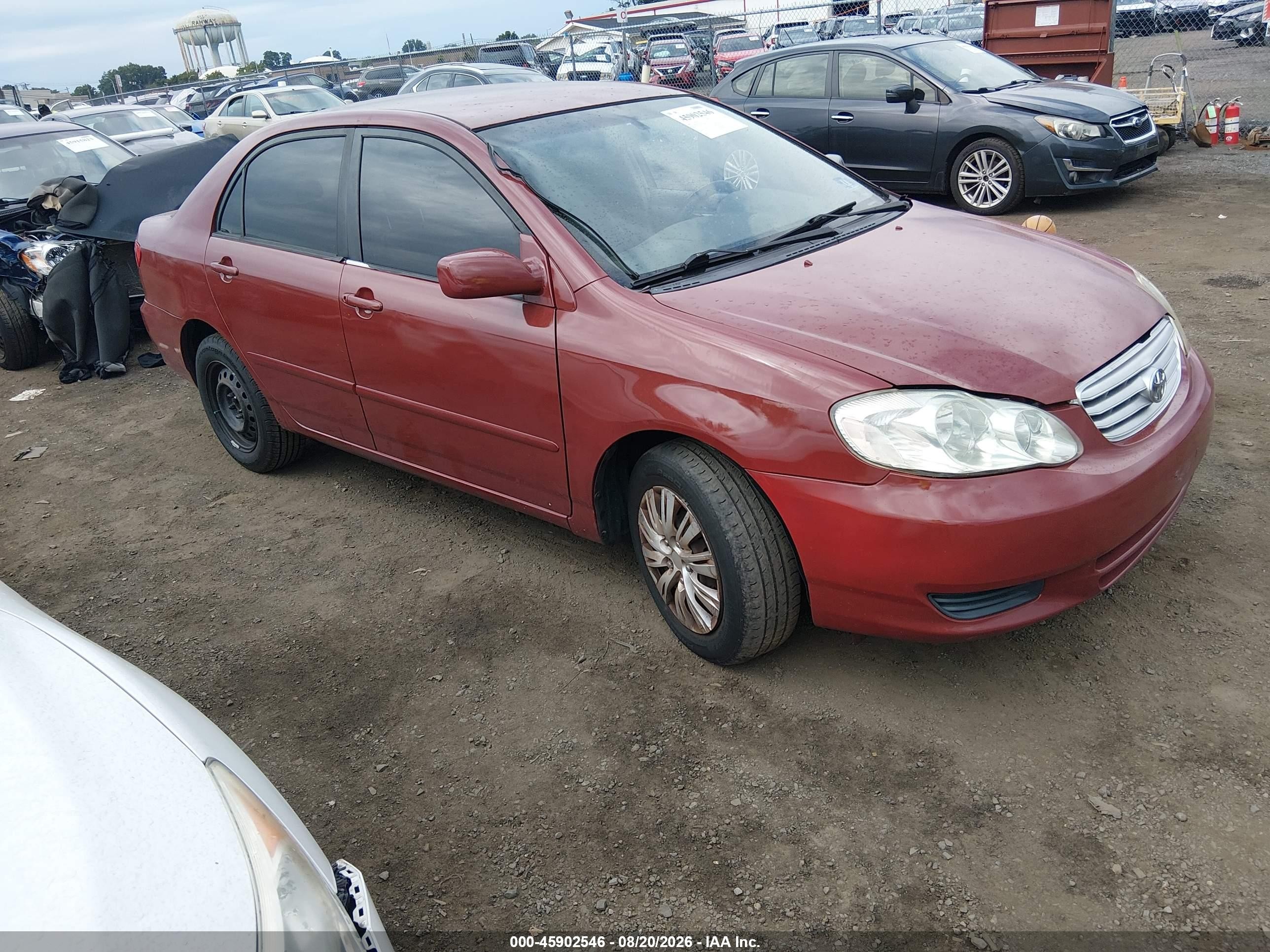 2004 Toyota Corolla Le Red vin: JTDBR32E442036793