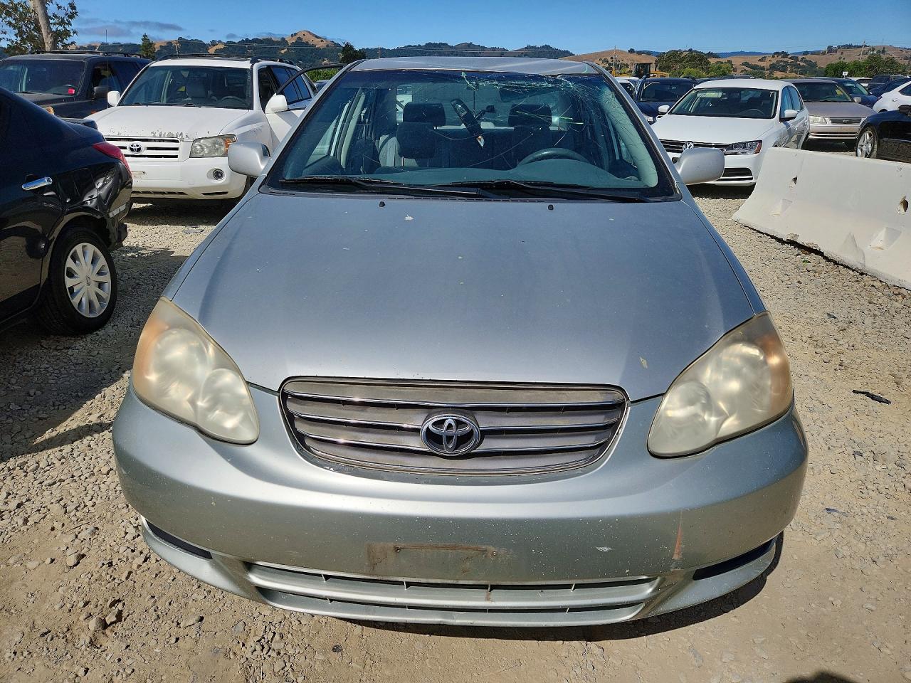 2004 Toyota Corolla Le Silver vin: JTDBR32E542027097