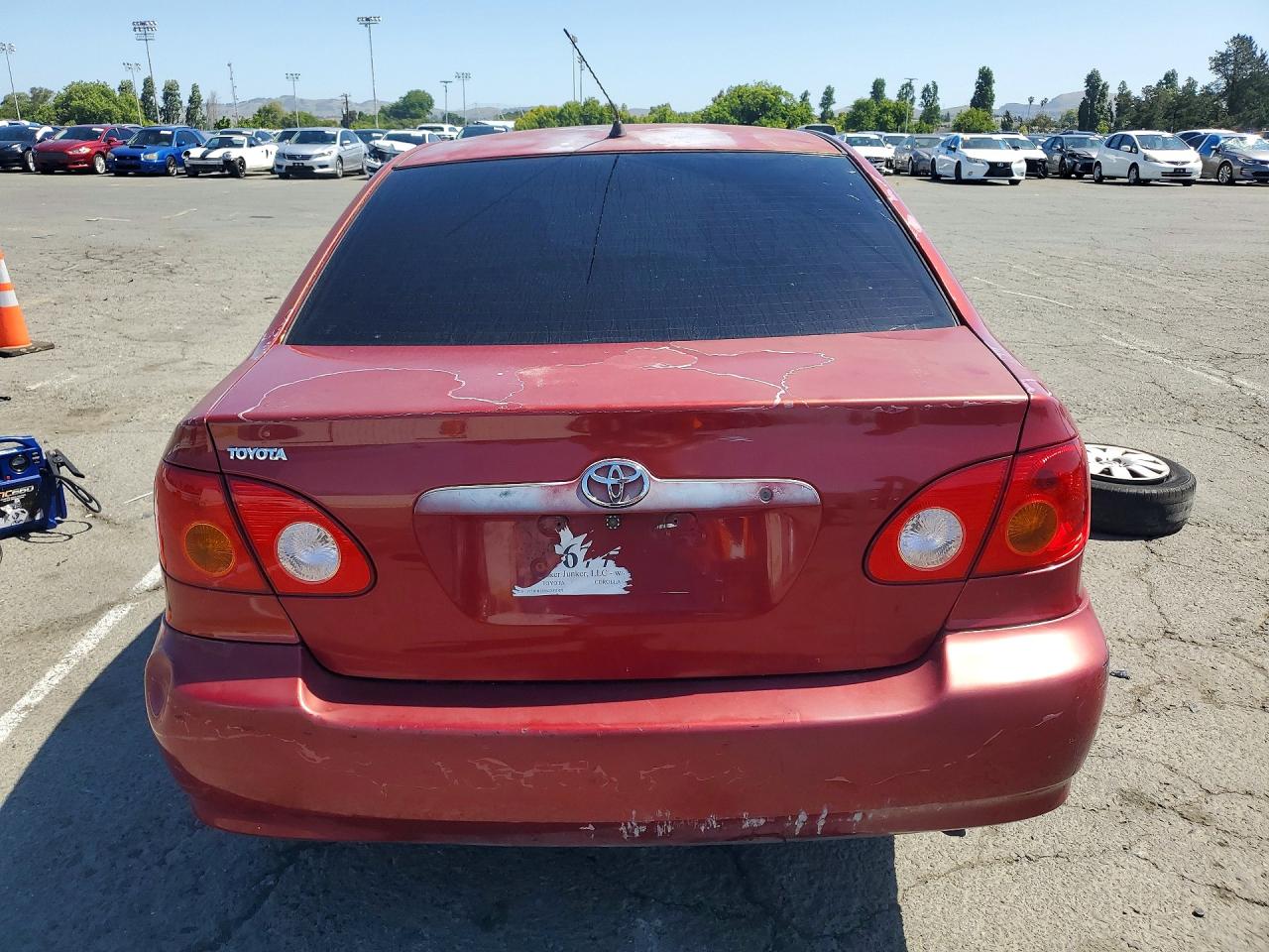 2004 Toyota Corolla Le Red vin: JTDBR32E642031871