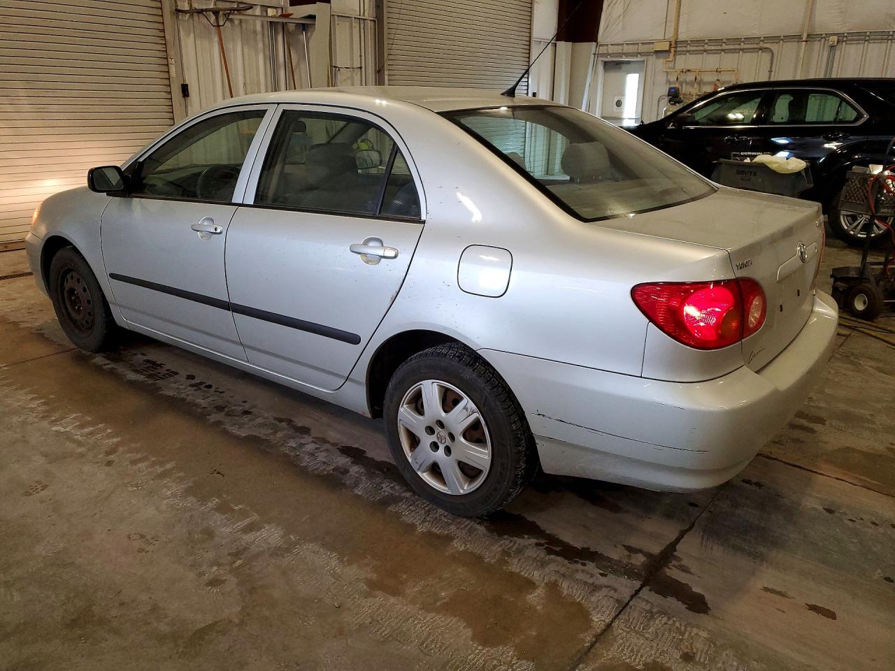 2004 Toyota Corolla Silver vin: JTDBR32E642036326