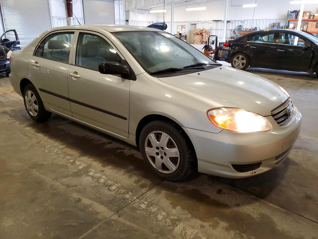 2004 Toyota Corolla Silver vin: JTDBR32E642036326