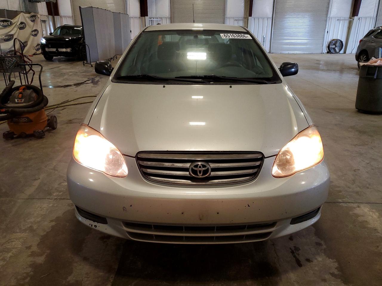 2004 Toyota Corolla Silver vin: JTDBR32E642036326