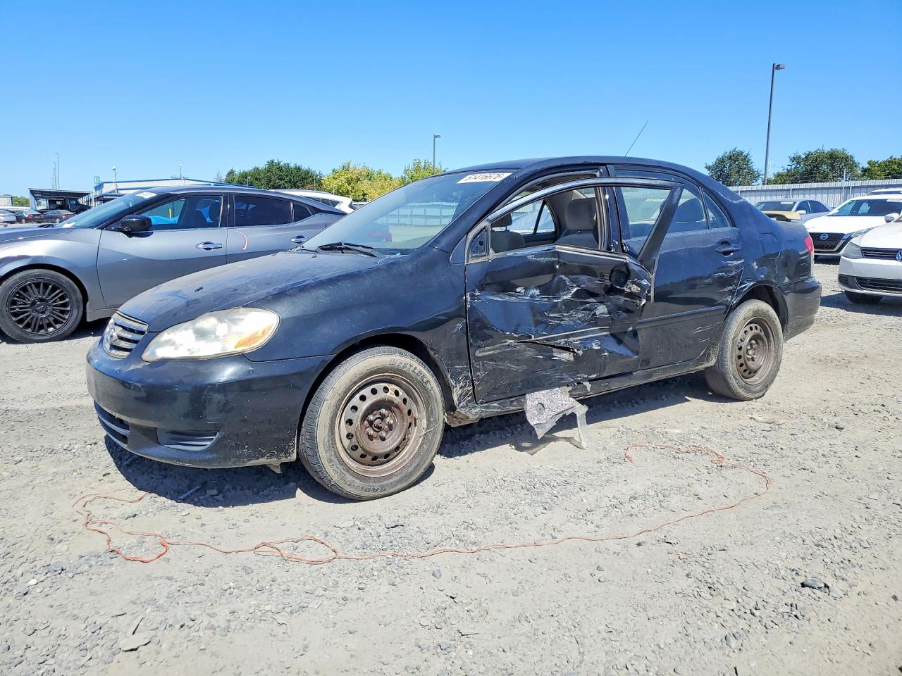 2003 Toyota Corolla Le Black vin: JTDBR32E830024088
