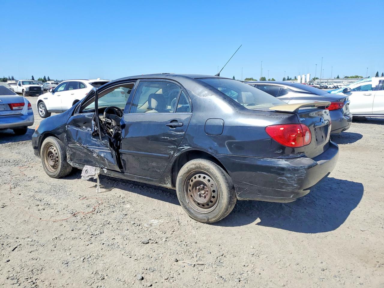2003 Toyota Corolla Le Black vin: JTDBR32E830024088