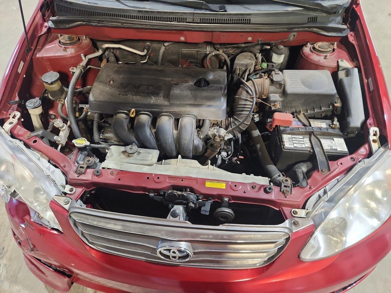 2003 Toyota Corolla Le Красный vin: JTDBR32E830034670