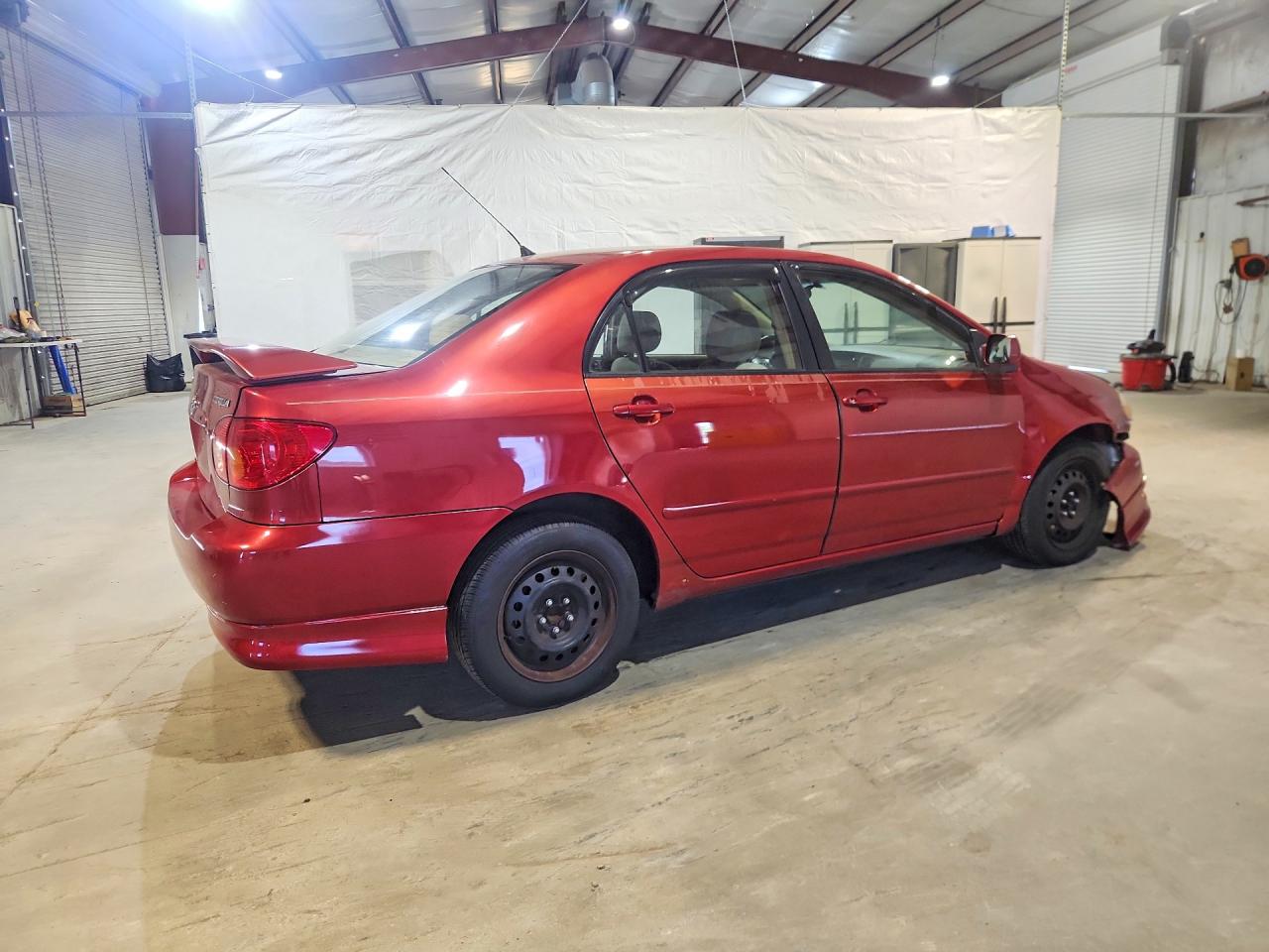 2003 Toyota Corolla Le Красный vin: JTDBR32E830034670