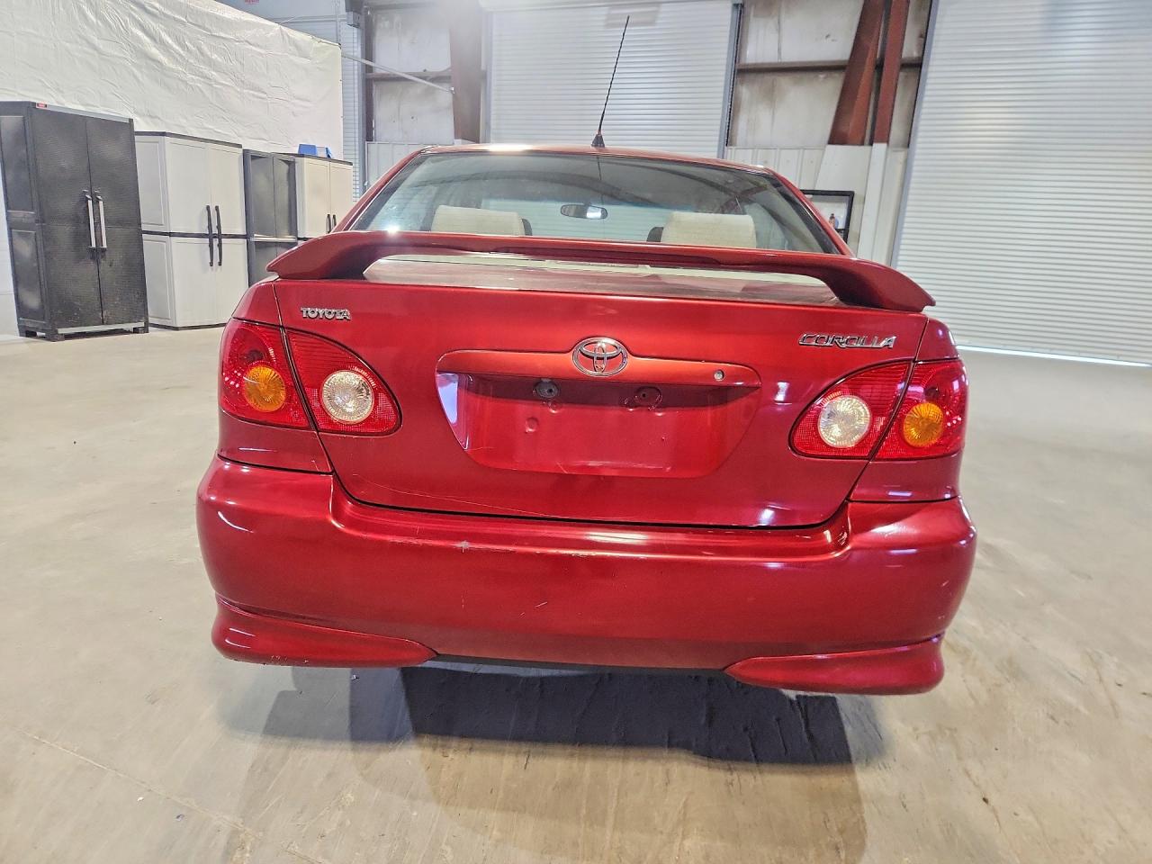 2003 Toyota Corolla Le Красный vin: JTDBR32E830034670