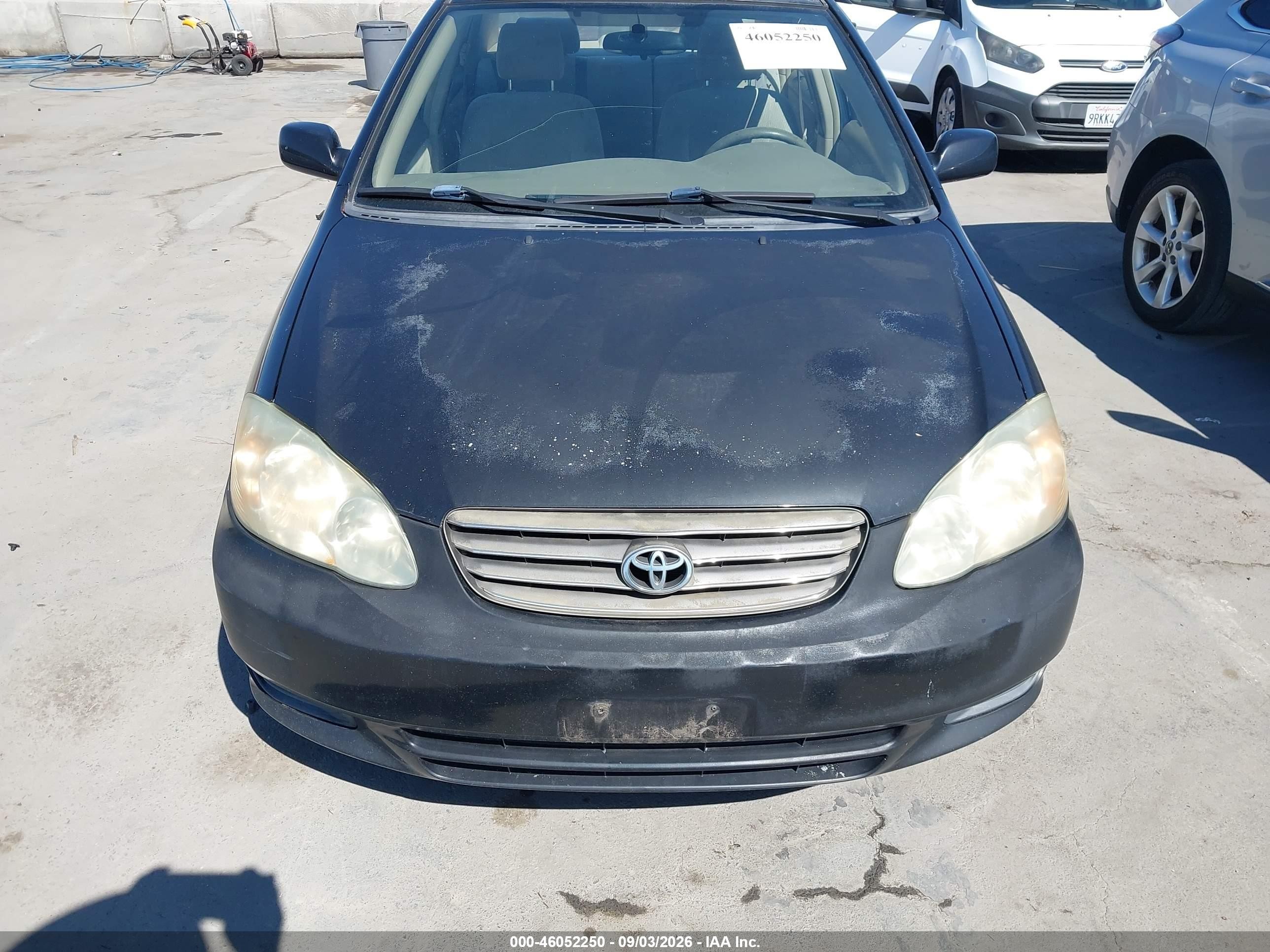 2003 Toyota Corolla Le Black vin: JTDBR32E830037097