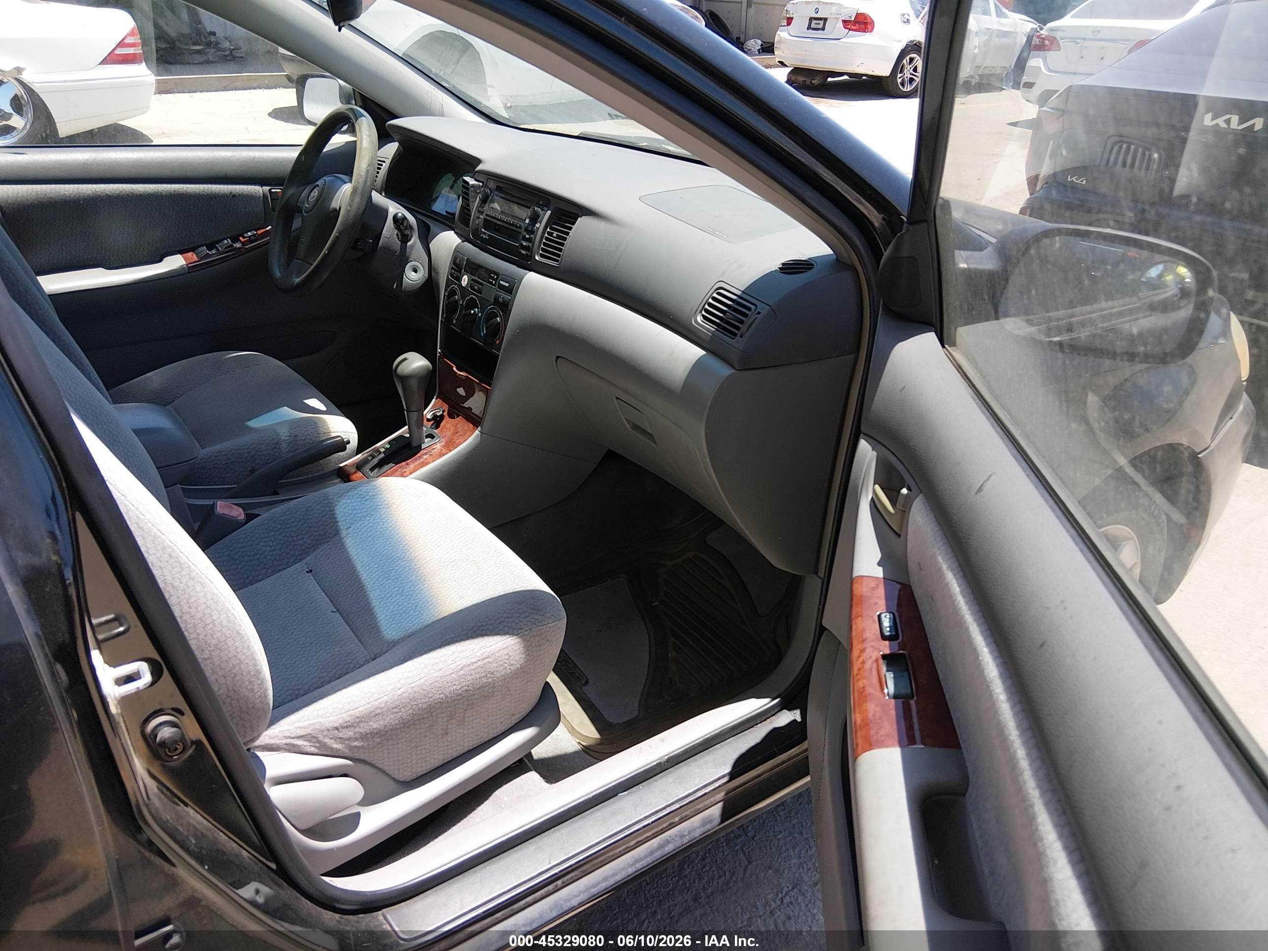 2004 Toyota Corolla Le Black vin: JTDBR32E842033489