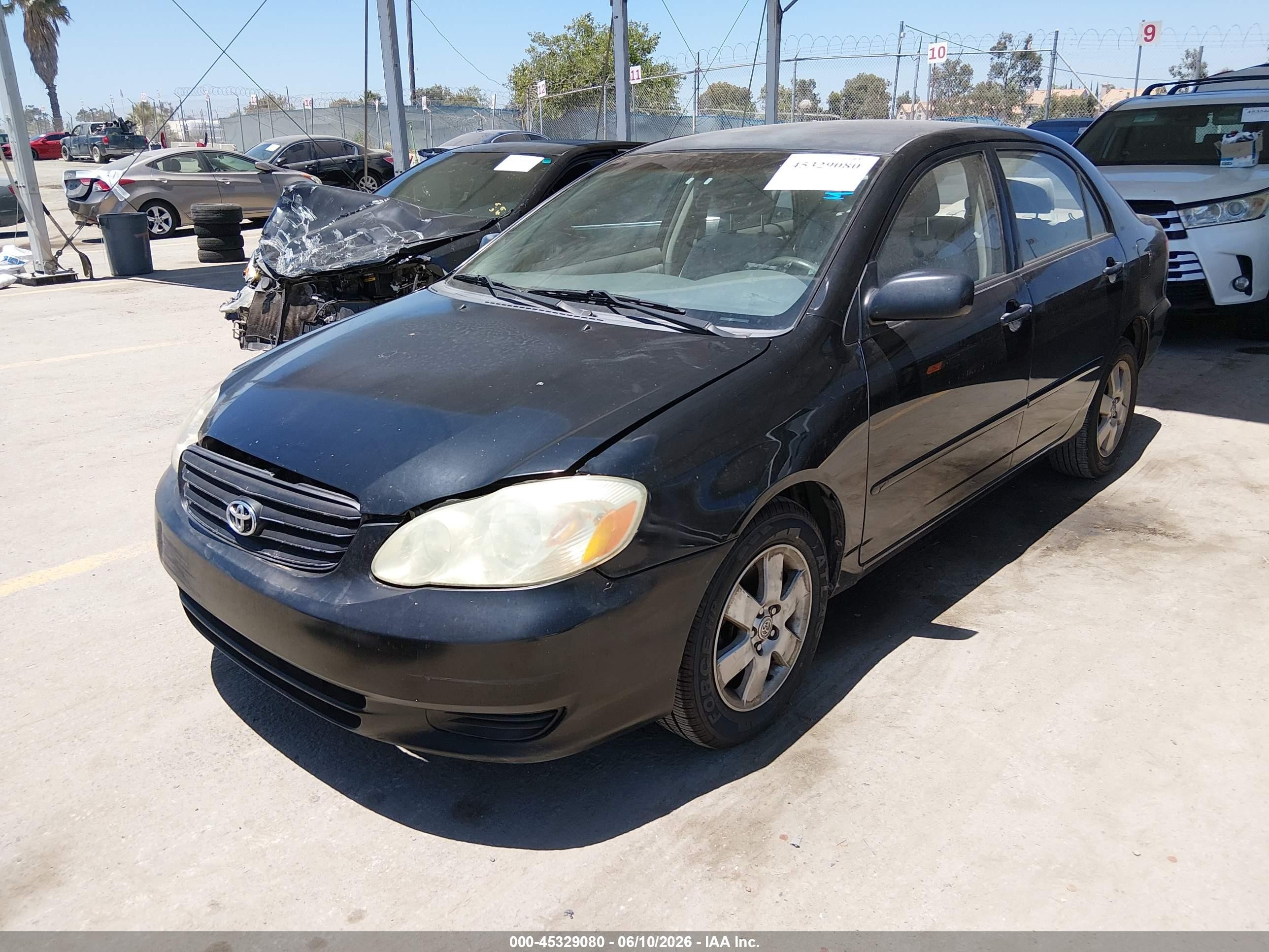 2004 Toyota Corolla Le Black vin: JTDBR32E842033489