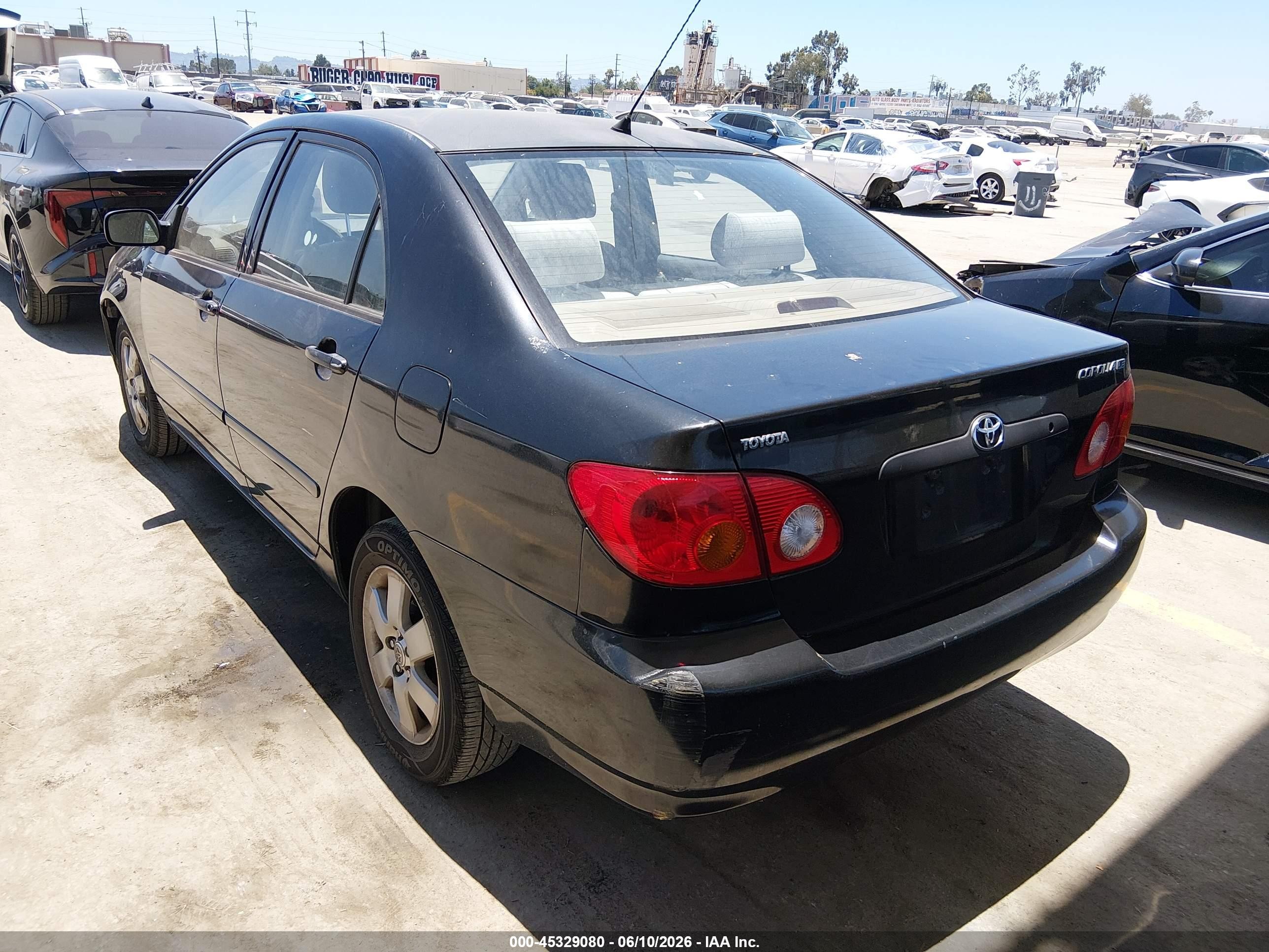 2004 Toyota Corolla Le Black vin: JTDBR32E842033489