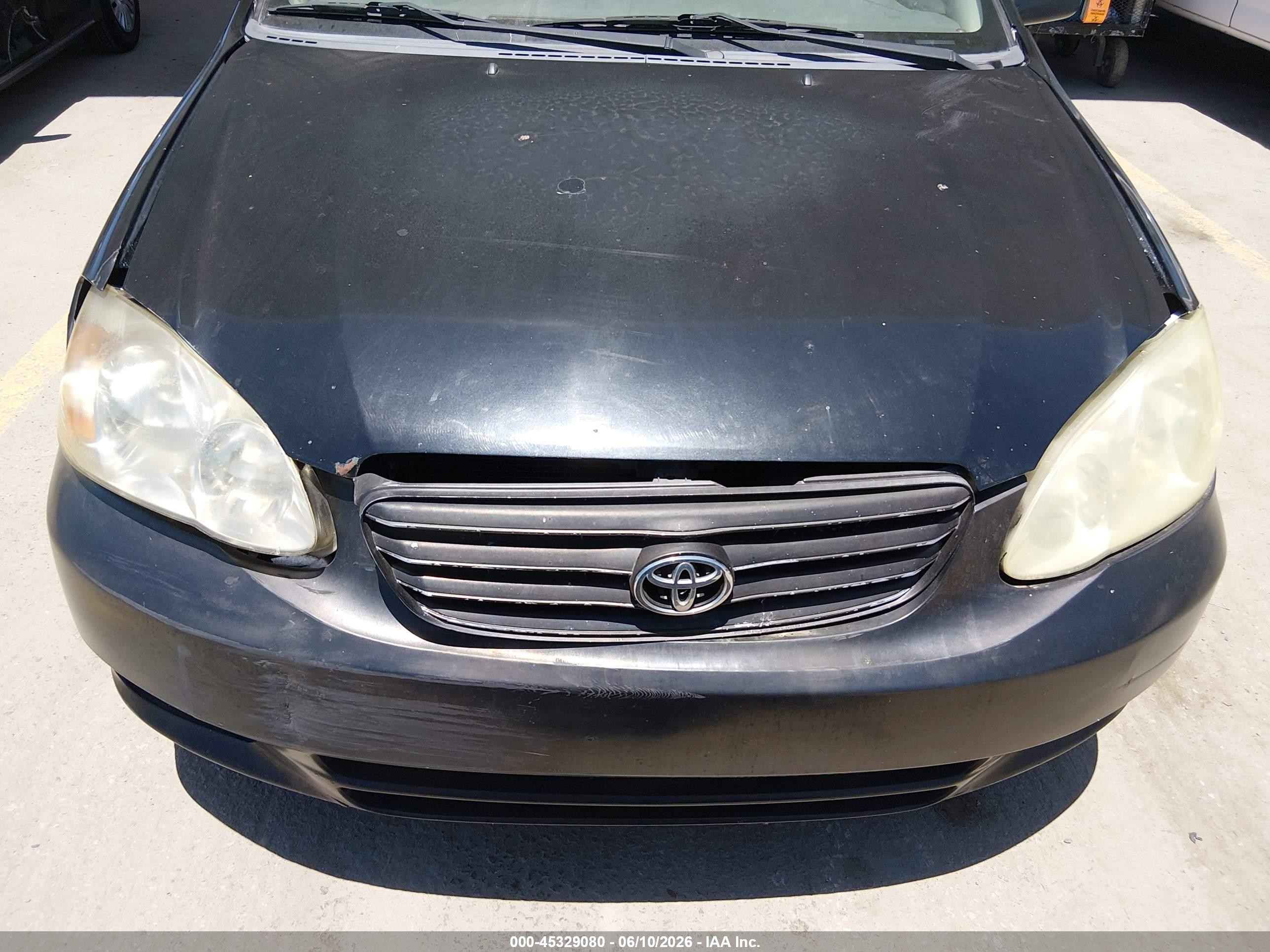 2004 Toyota Corolla Le Black vin: JTDBR32E842033489