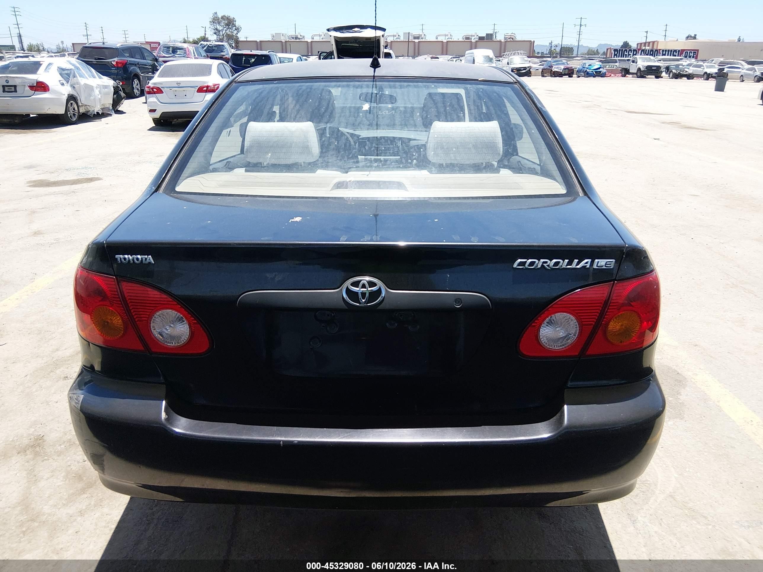 2004 Toyota Corolla Le Black vin: JTDBR32E842033489