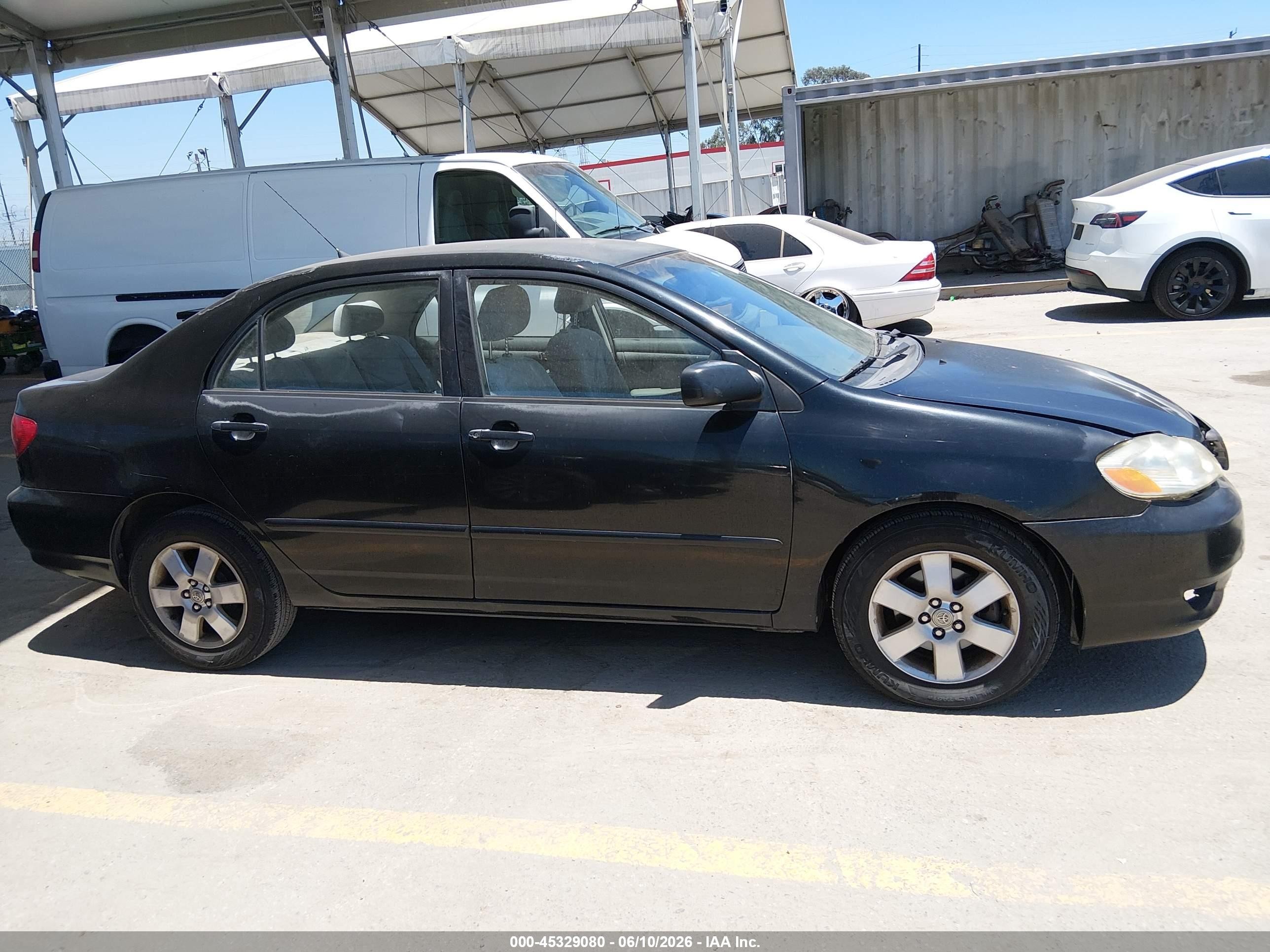 2004 Toyota Corolla Le Black vin: JTDBR32E842033489