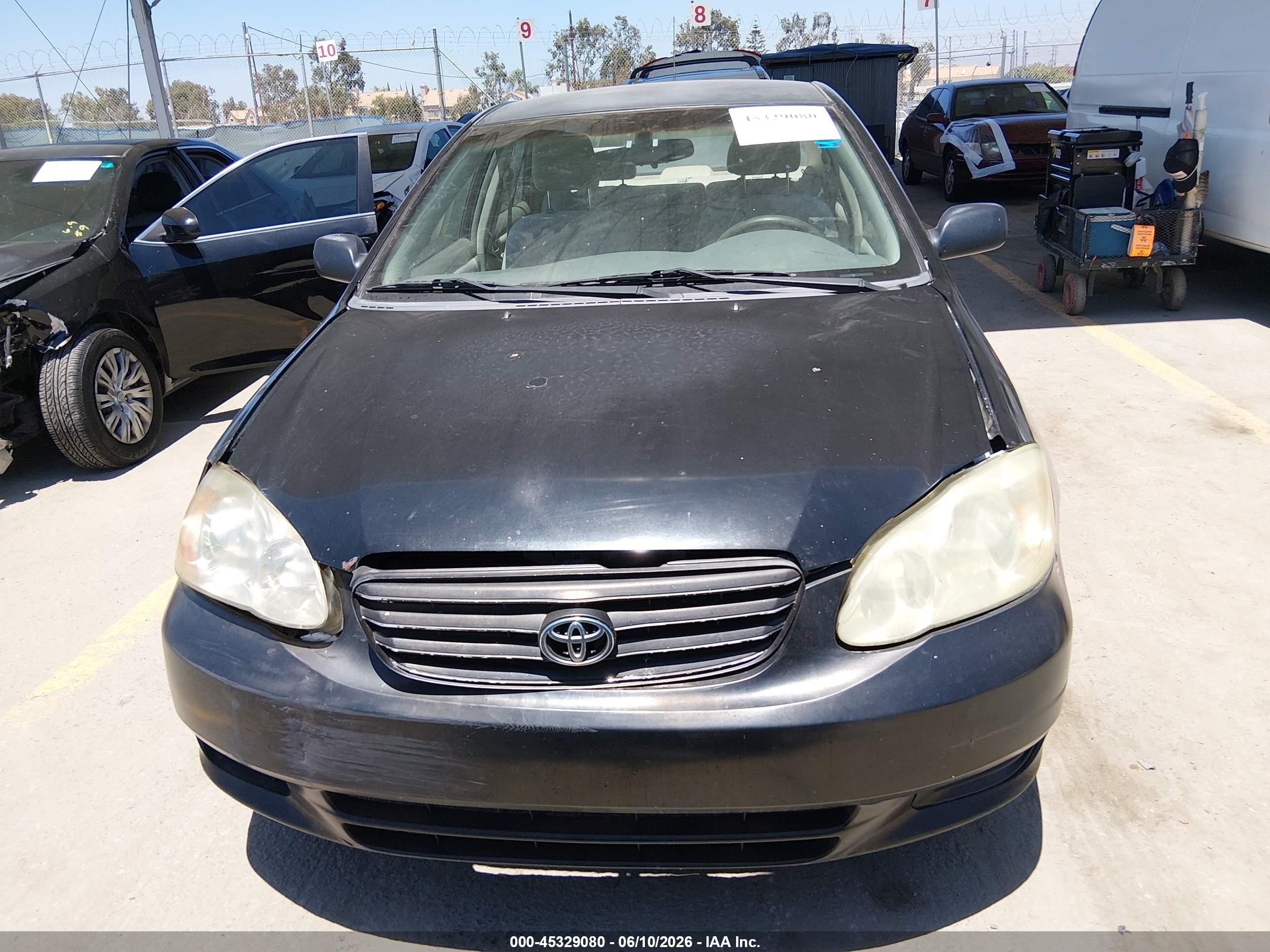 2004 Toyota Corolla Le Black vin: JTDBR32E842033489