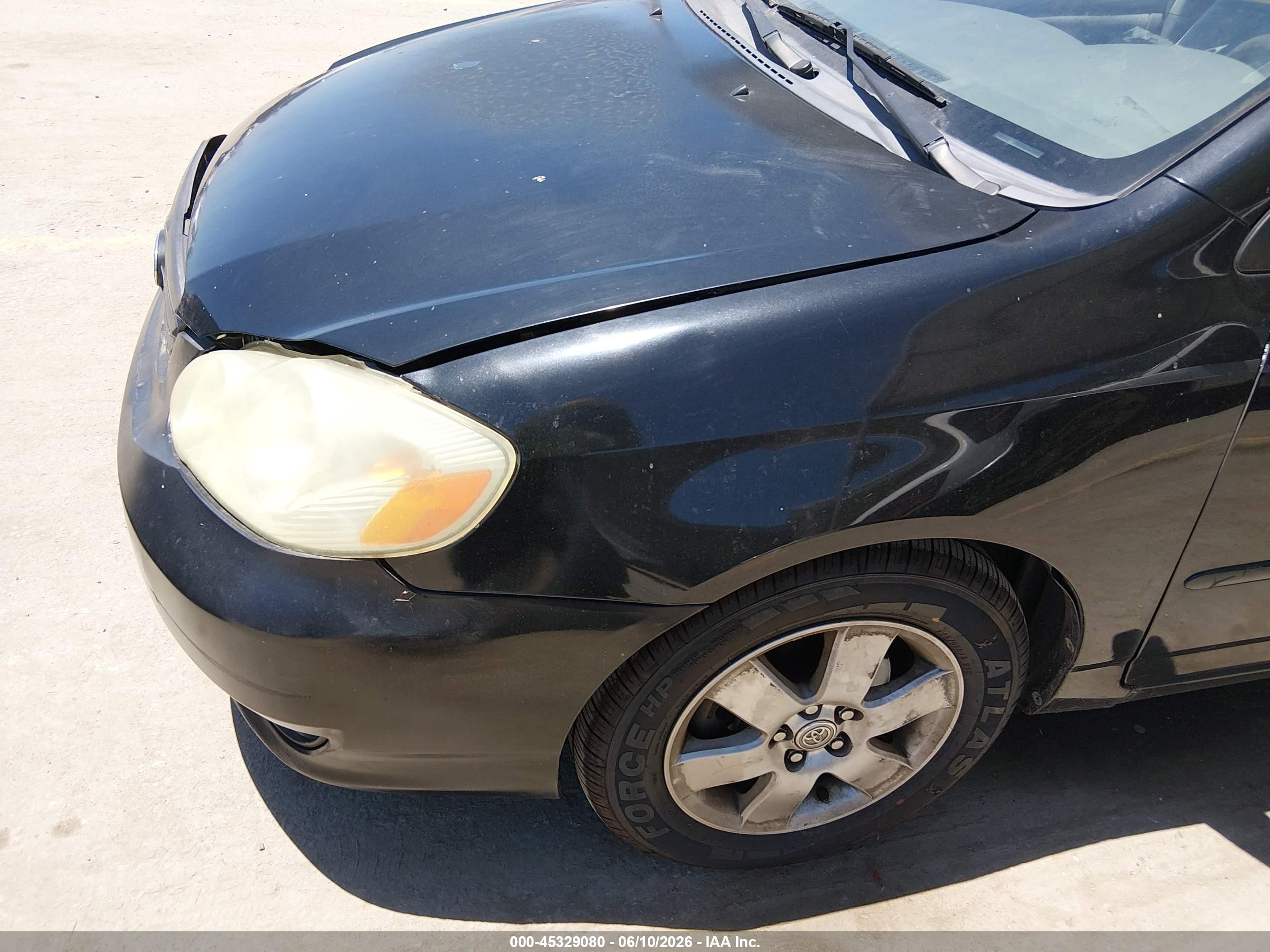 2004 Toyota Corolla Le Black vin: JTDBR32E842033489