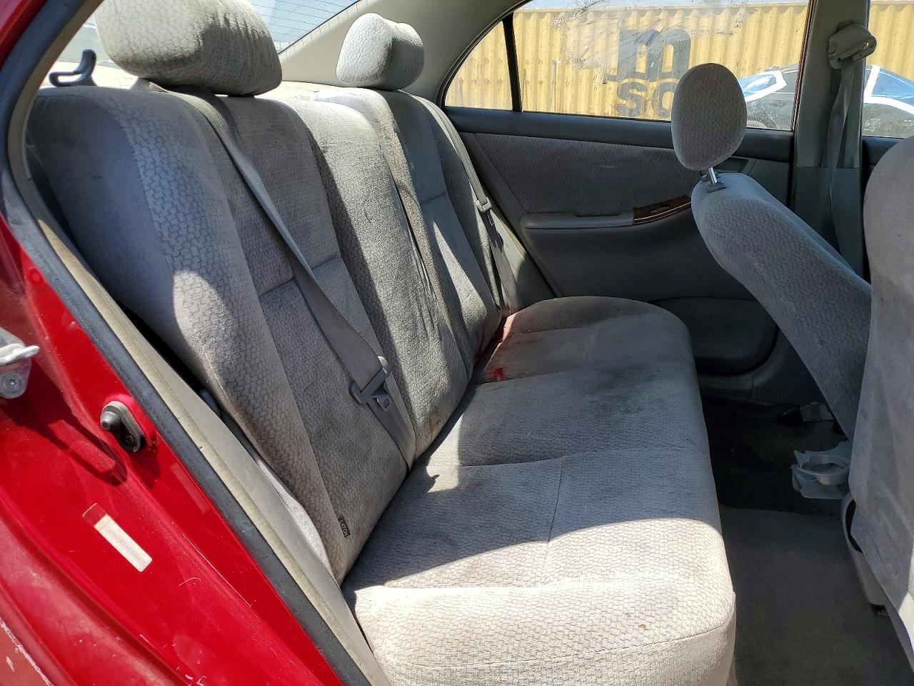 2003 Toyota Corolla Le Красный vin: JTDBR32E930046813