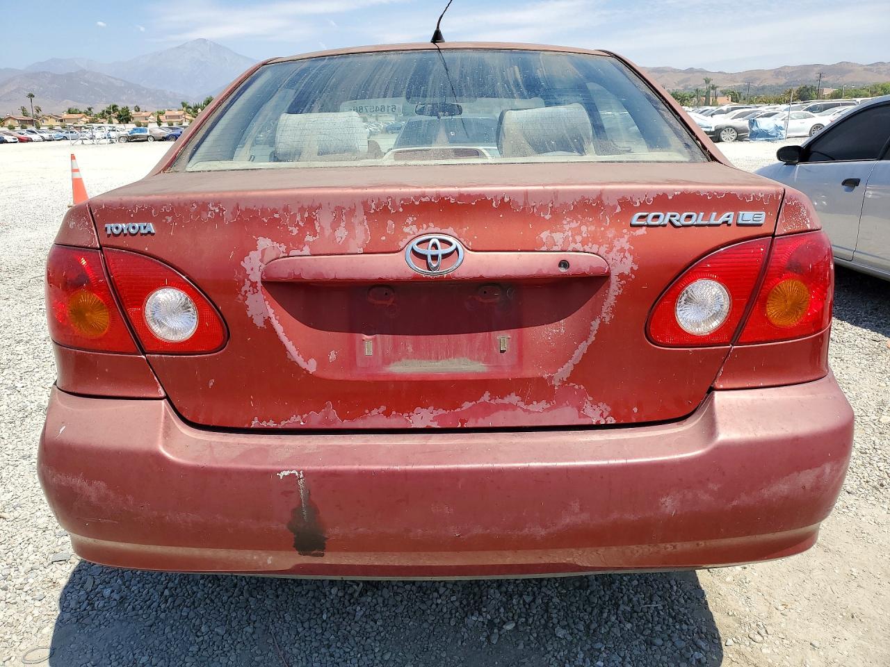2003 Toyota Corolla Le Красный vin: JTDBR32E930046813