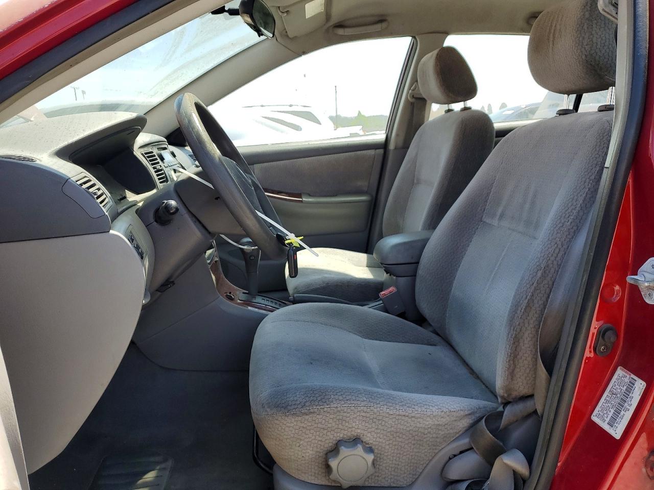 2003 Toyota Corolla Le Красный vin: JTDBR32E930046813