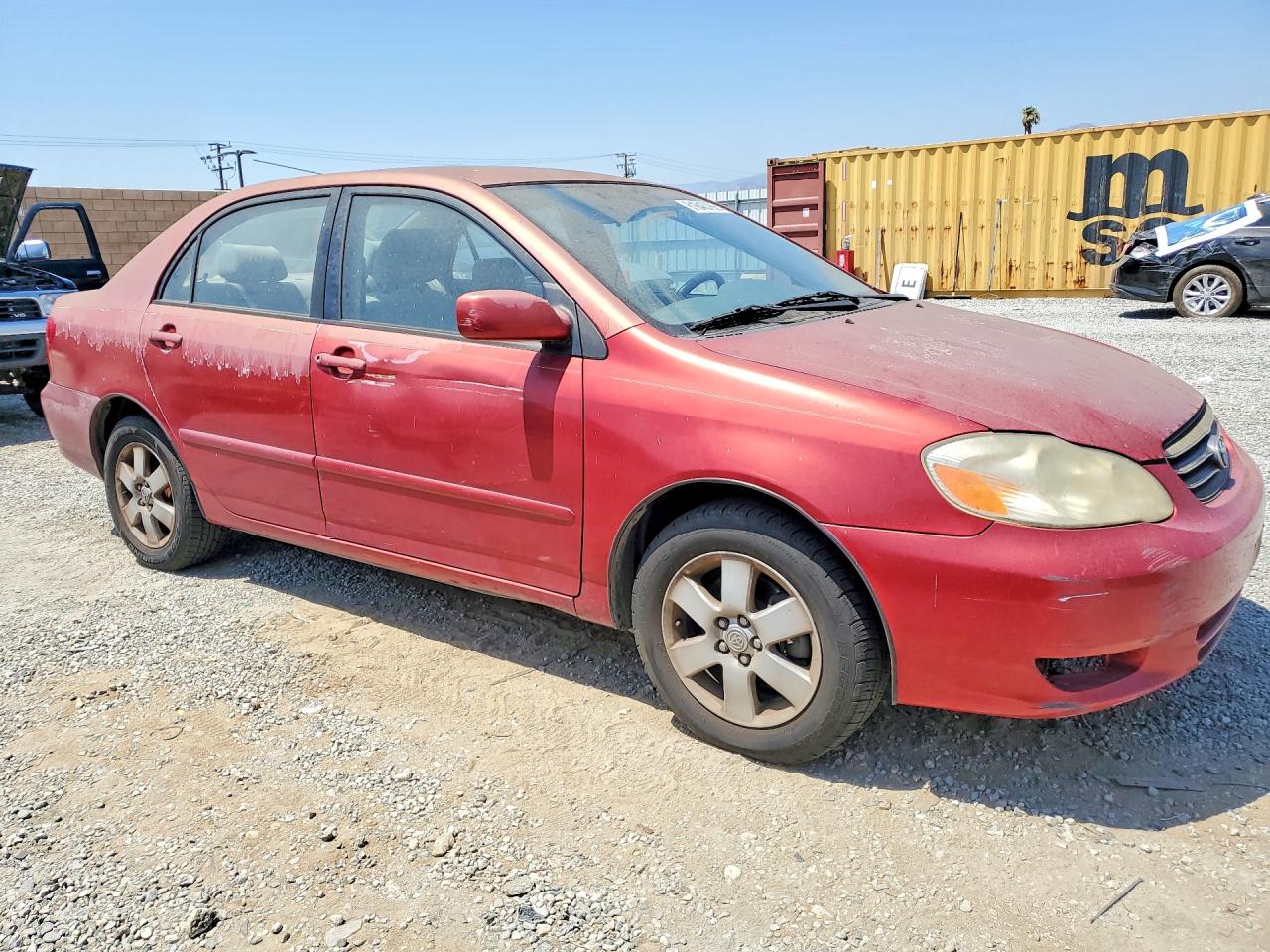 2003 Toyota Corolla Le Красный vin: JTDBR32E930046813